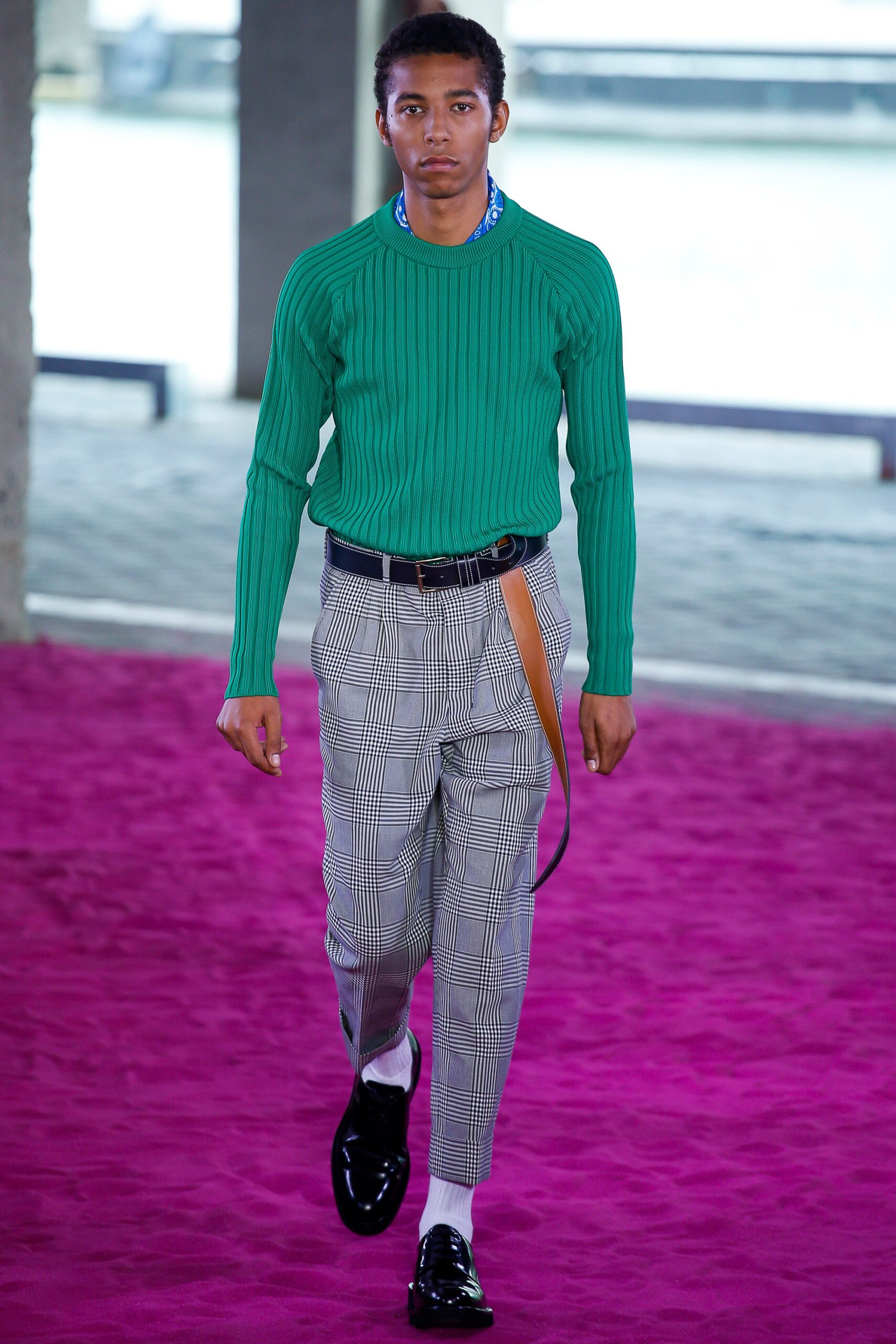 green ribbed sweater with tailored pants