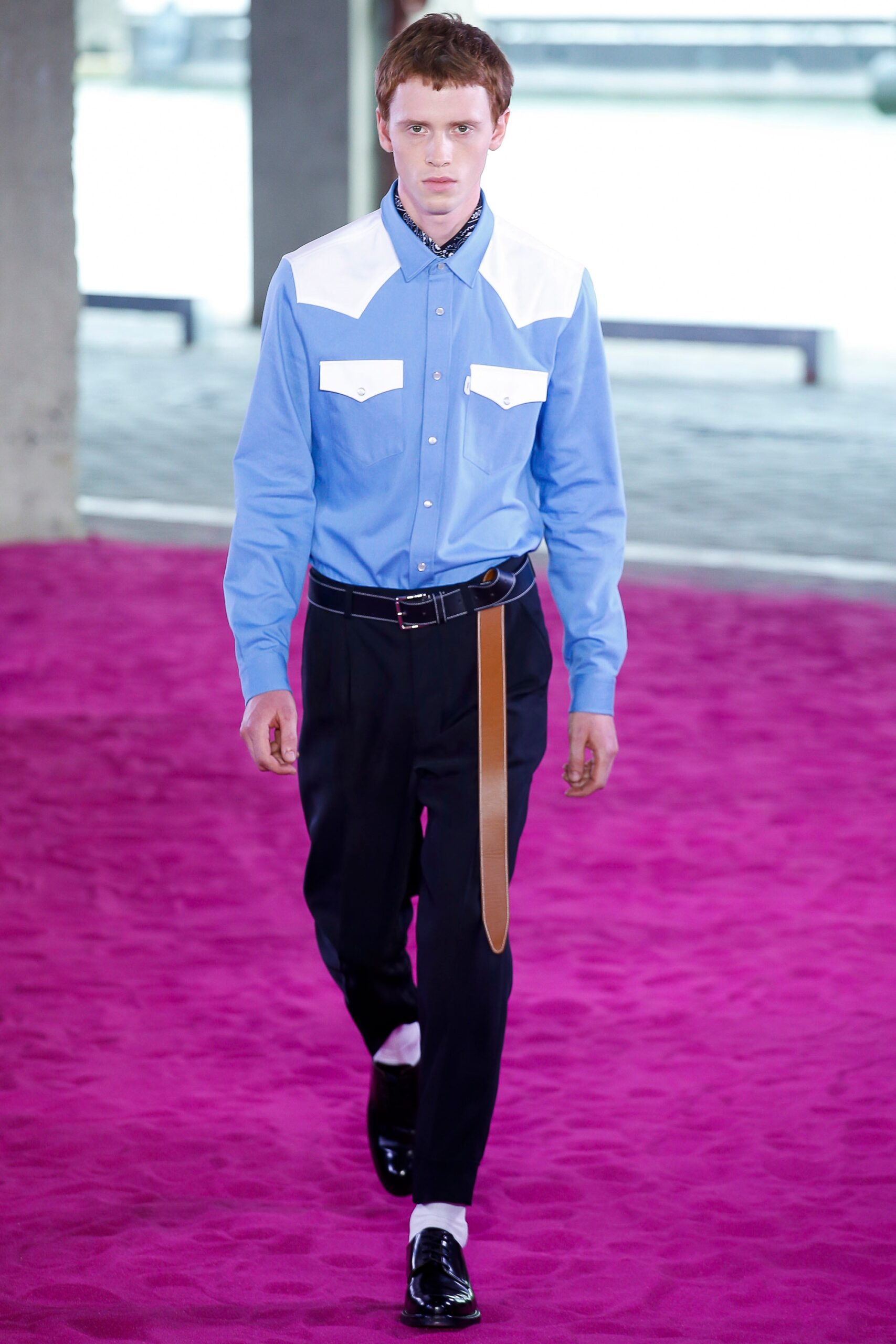 blue fitted shirt with black pants