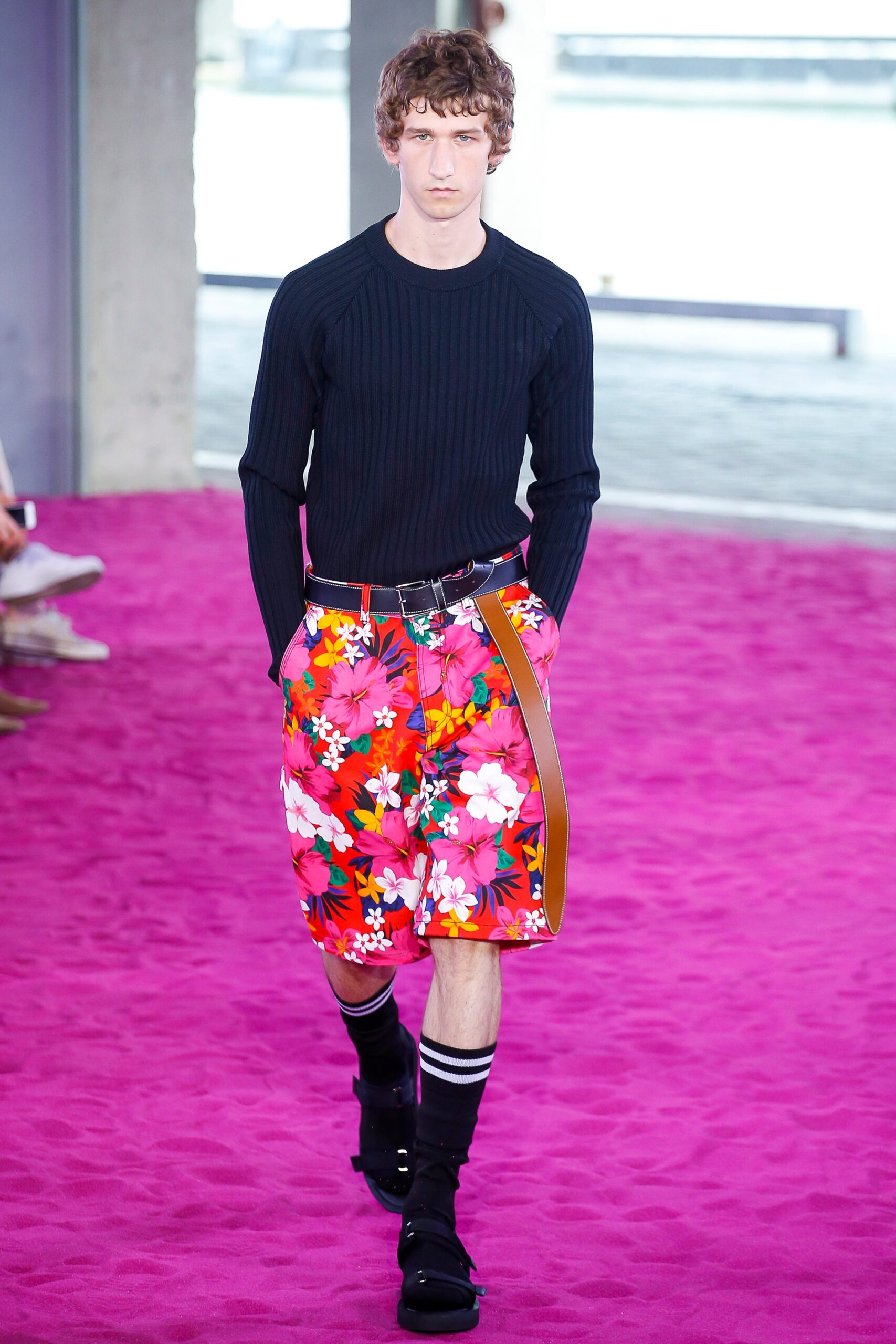 black fitted top with floral shorts