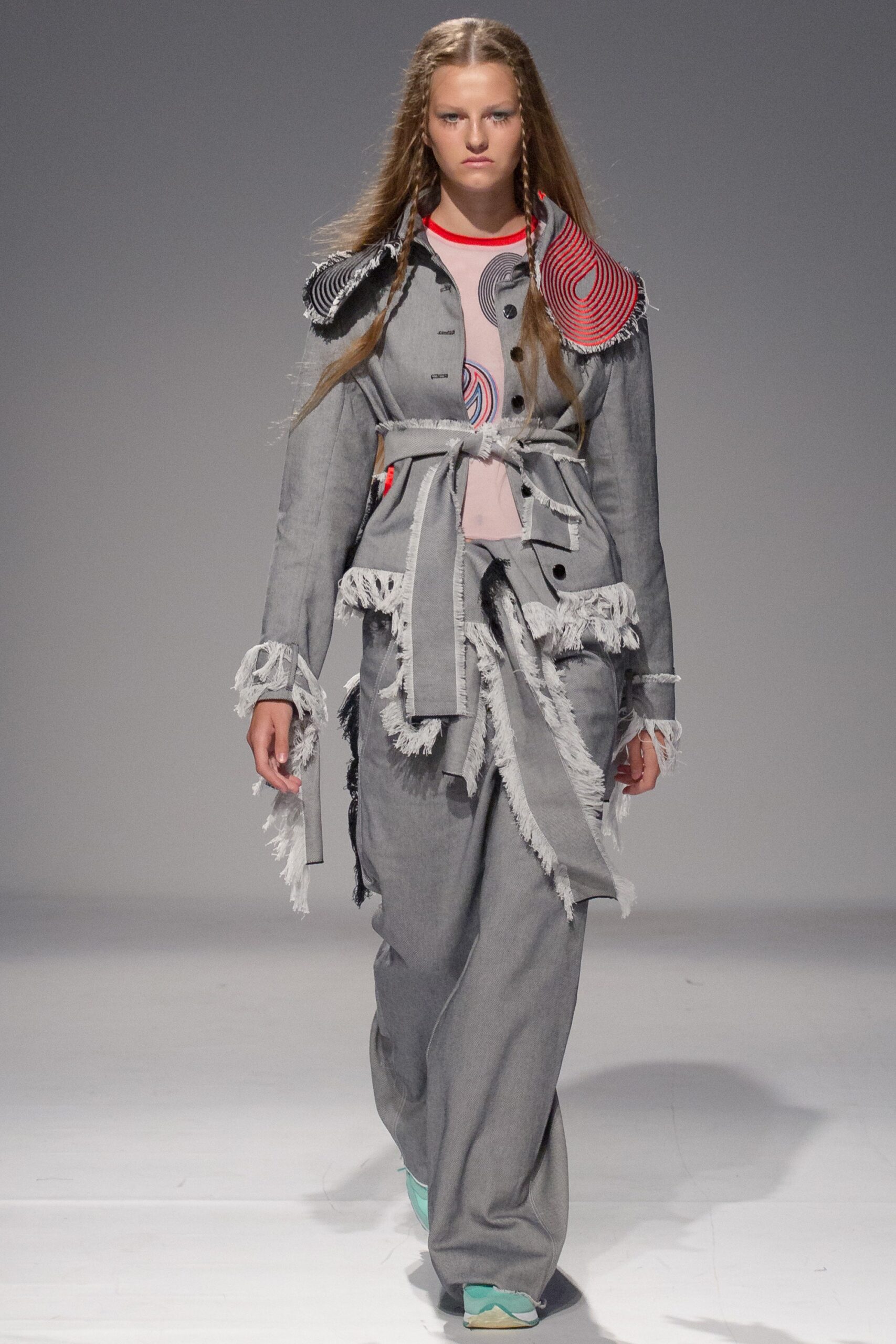 gray denim jacket with fringes