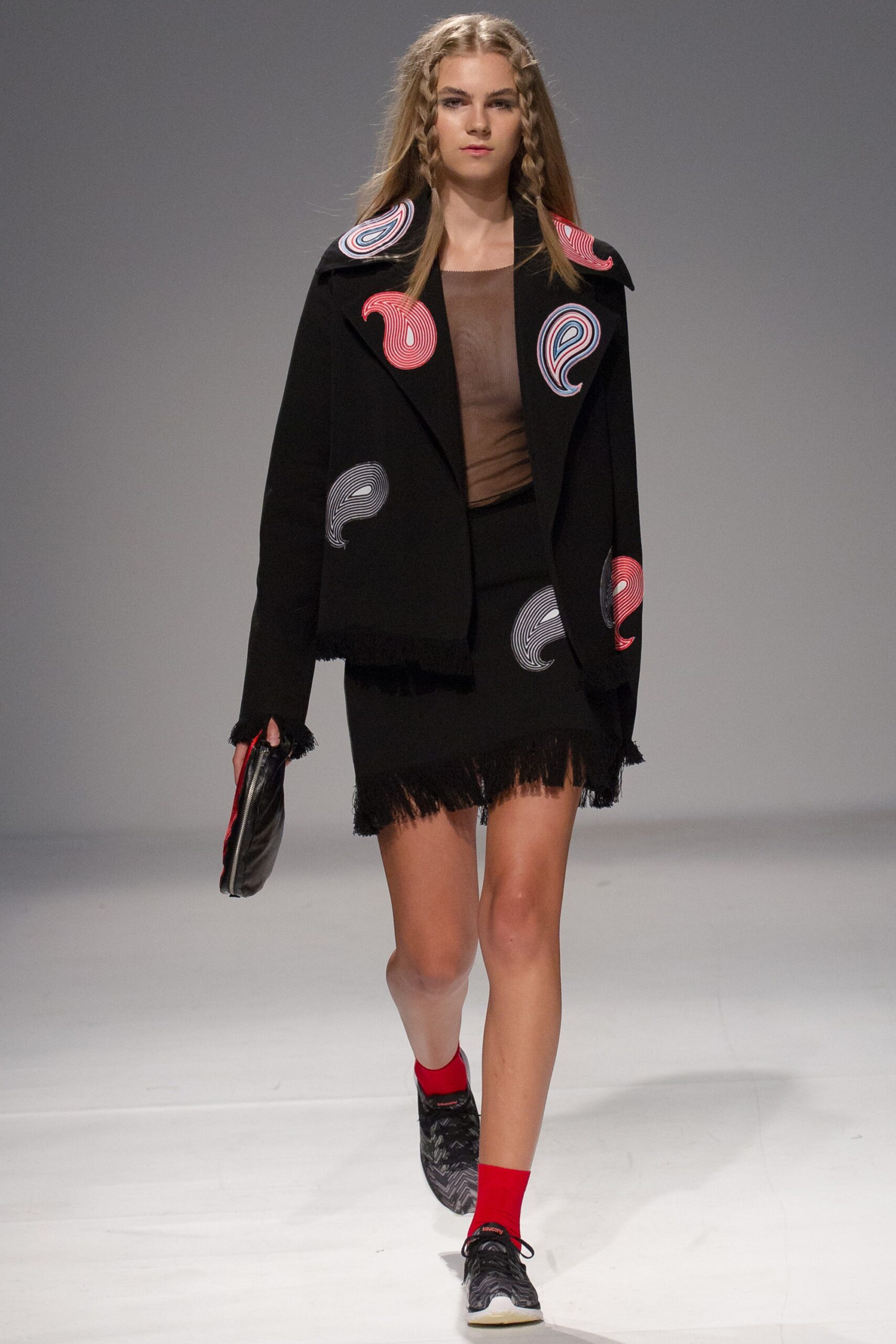 black embroidered jacket with mini skirt