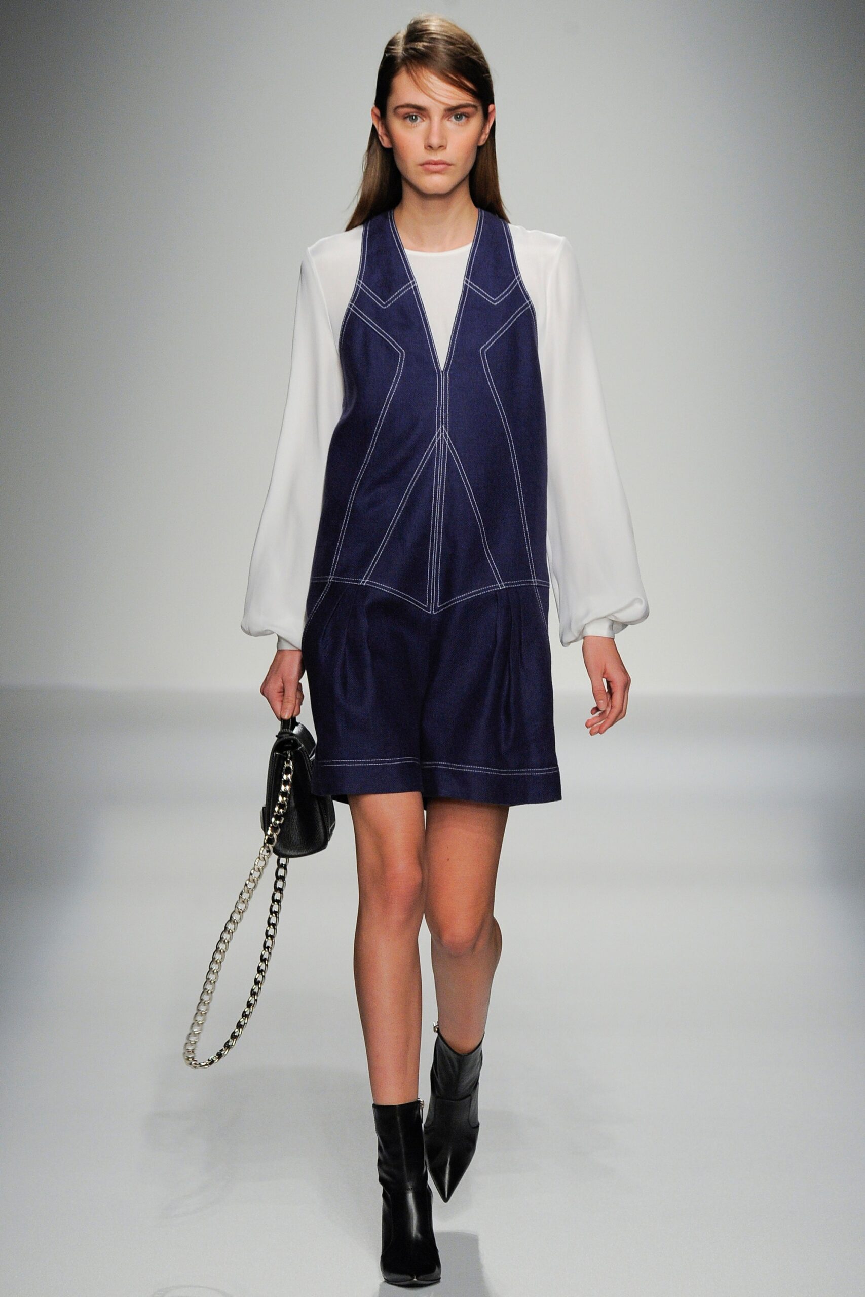 blue denim sleeveless dress with white blouse