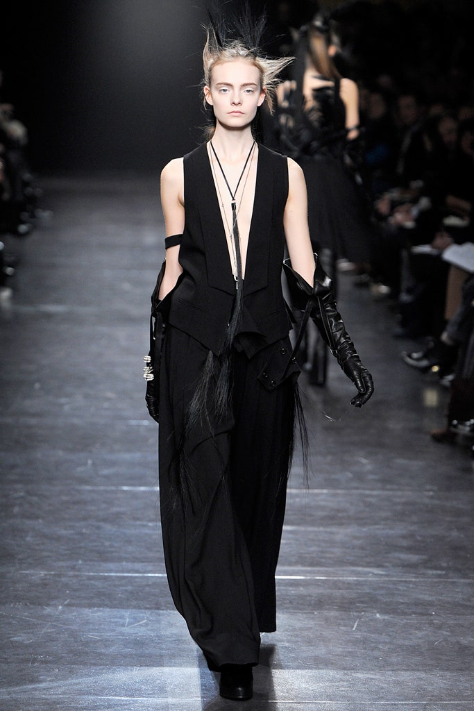 black fitted jumpsuit with gloves