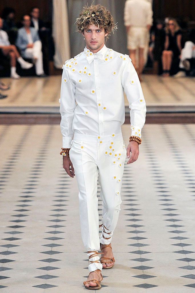 white embroidered shirt and pants