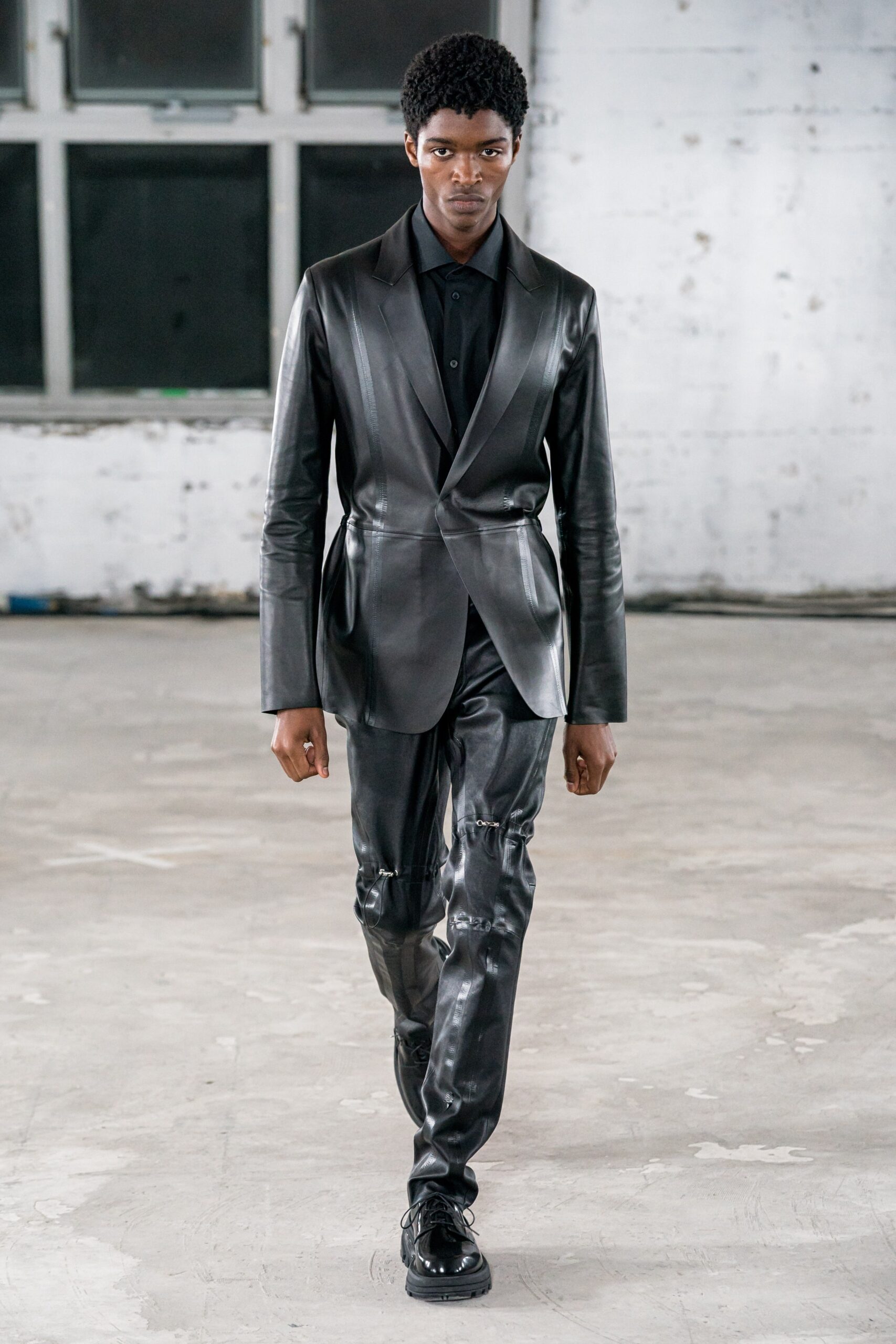 black leather fitted zippered pants