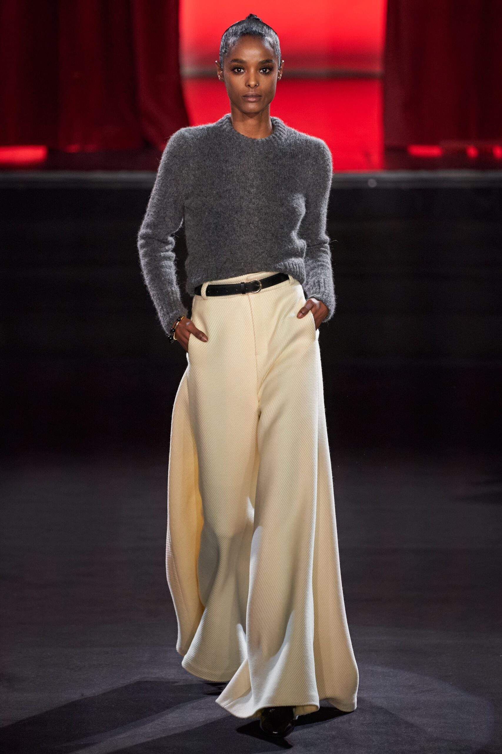 gray fitted sweater and beige wide-leg pants
