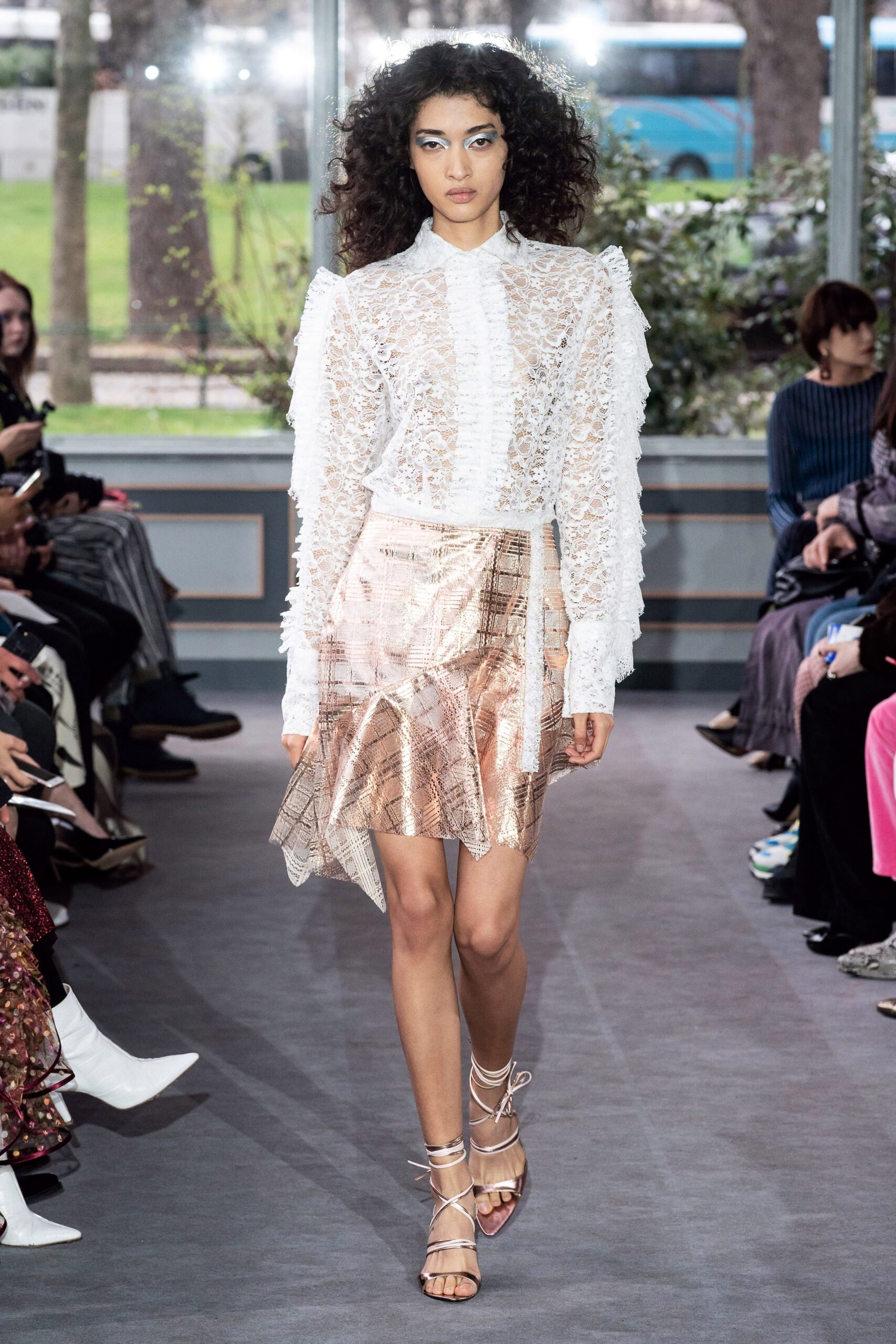 white lace blouse with gold skirt
