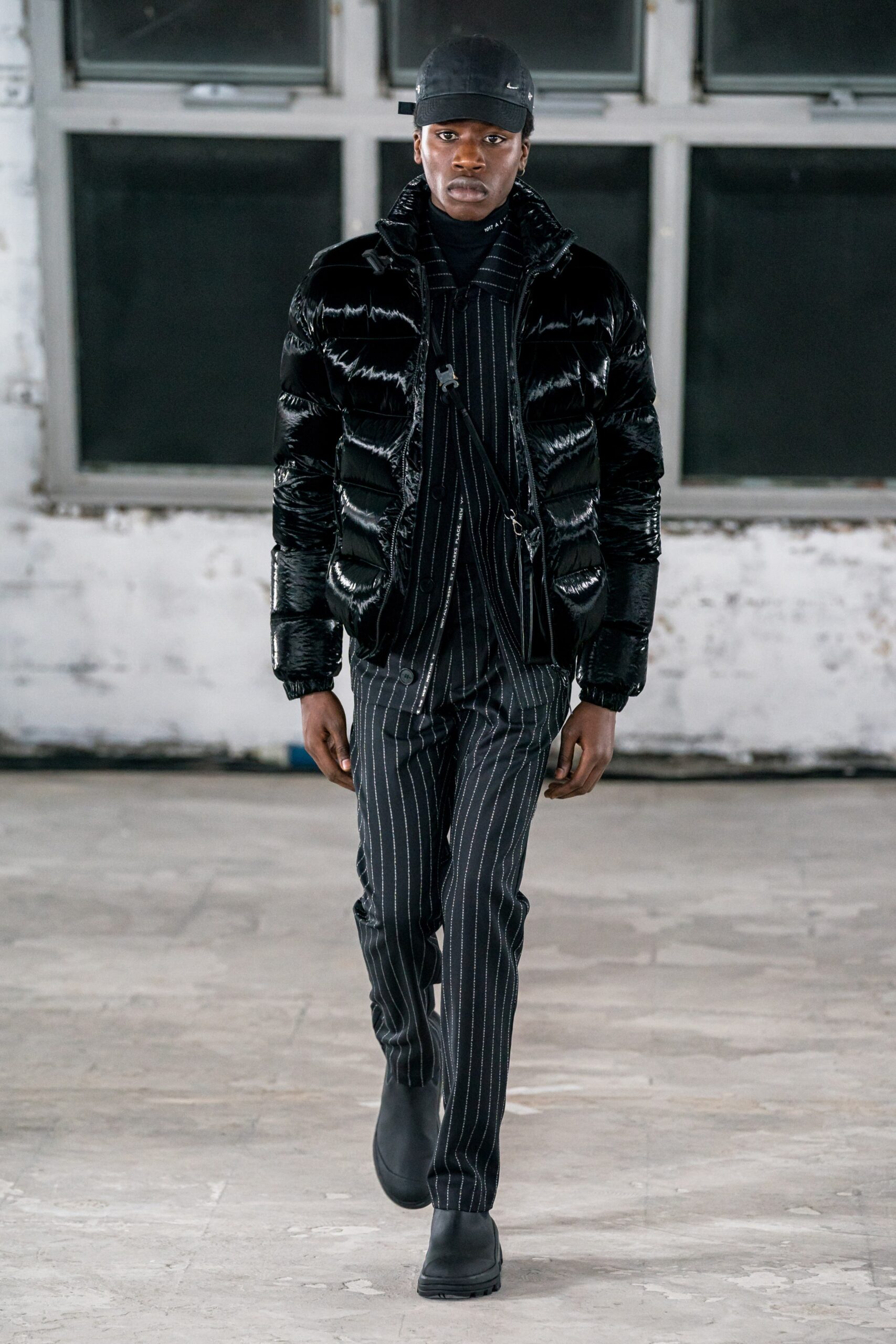 black vinyl long-sleeve collared fitted zippered shiny jacket