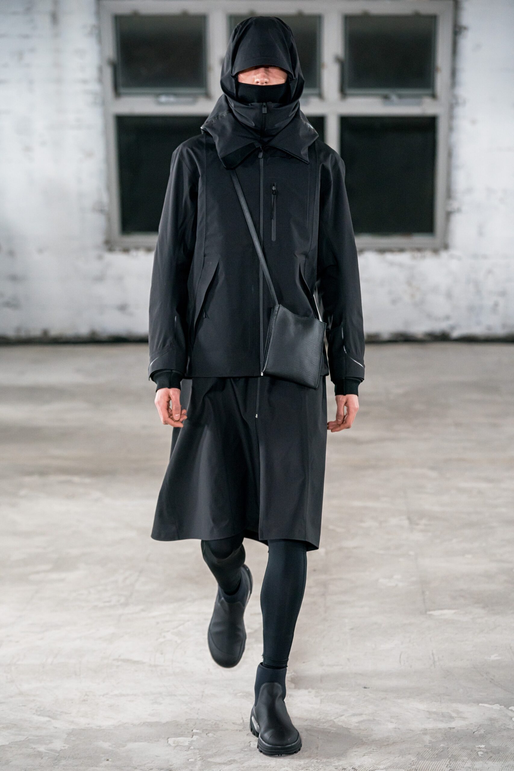 black neoprene fitted straight-leg pants