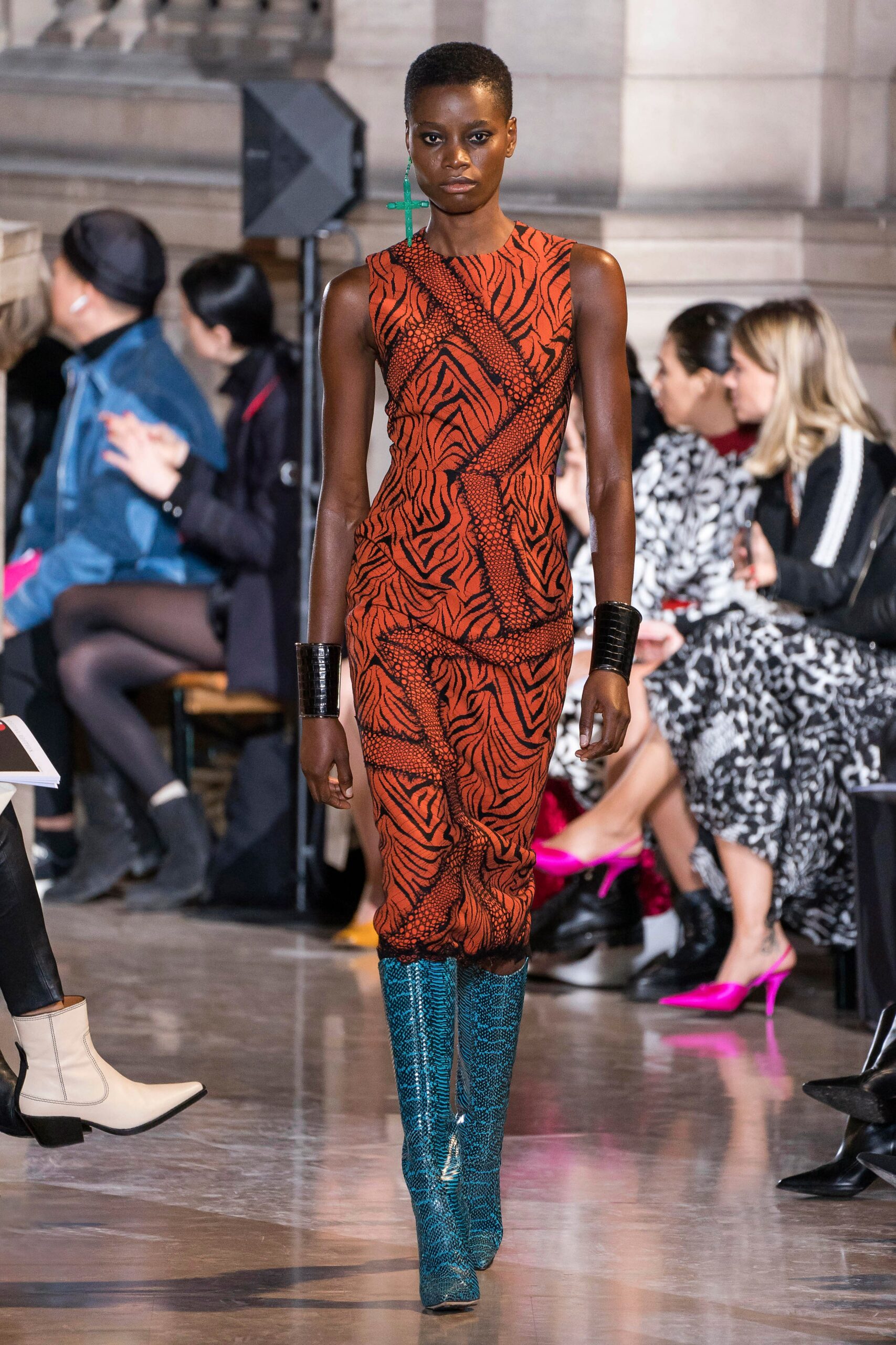 orange black animal-print midi dress with blue boots