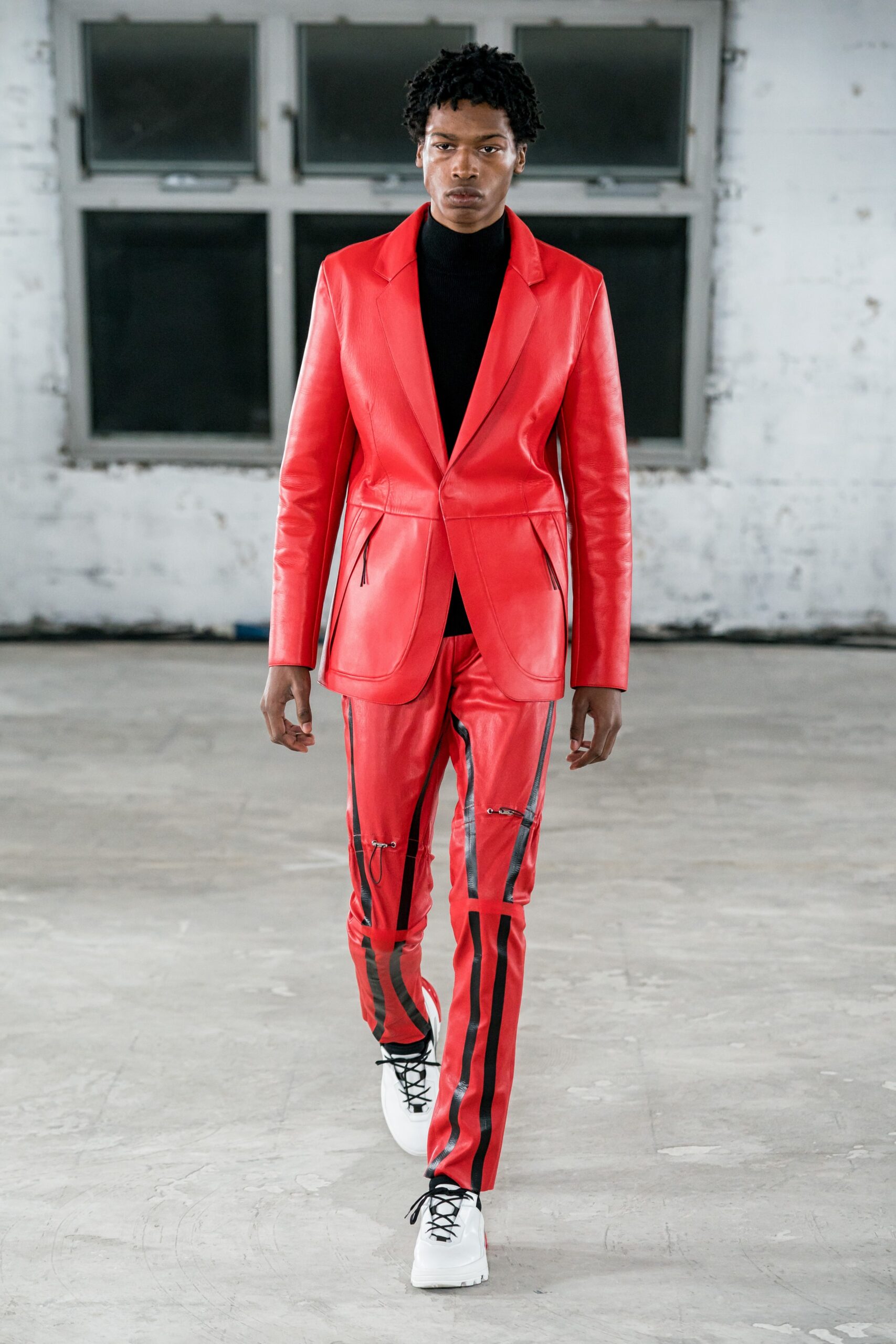 red leather long-sleeve collared fitted zippered suit