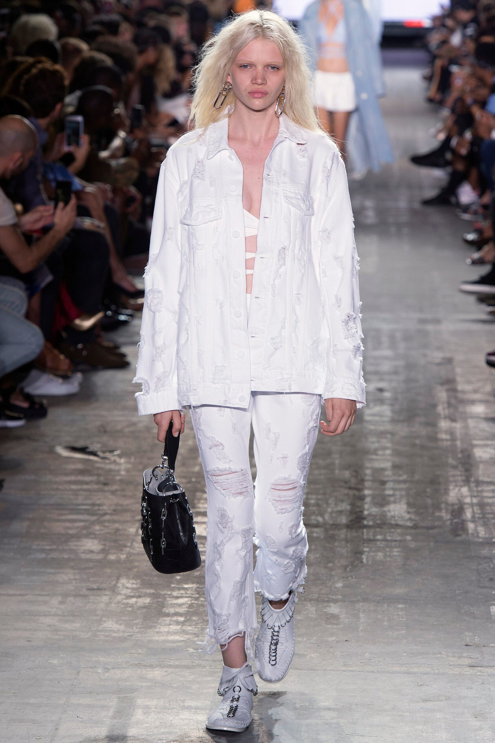 white denim long-sleeve collared relaxed distressed jacket