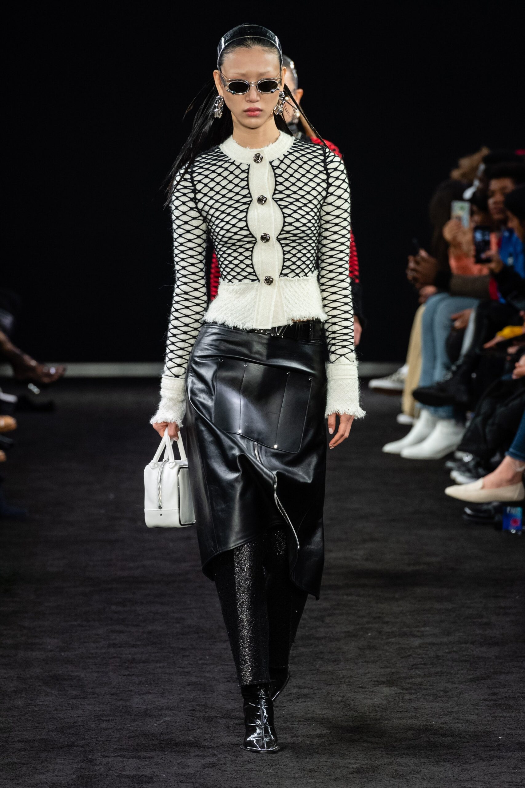 fitted black leather skirt and white top