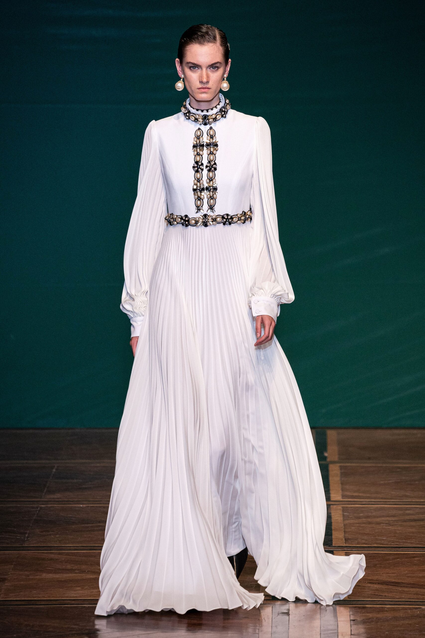 white silk pleated gown