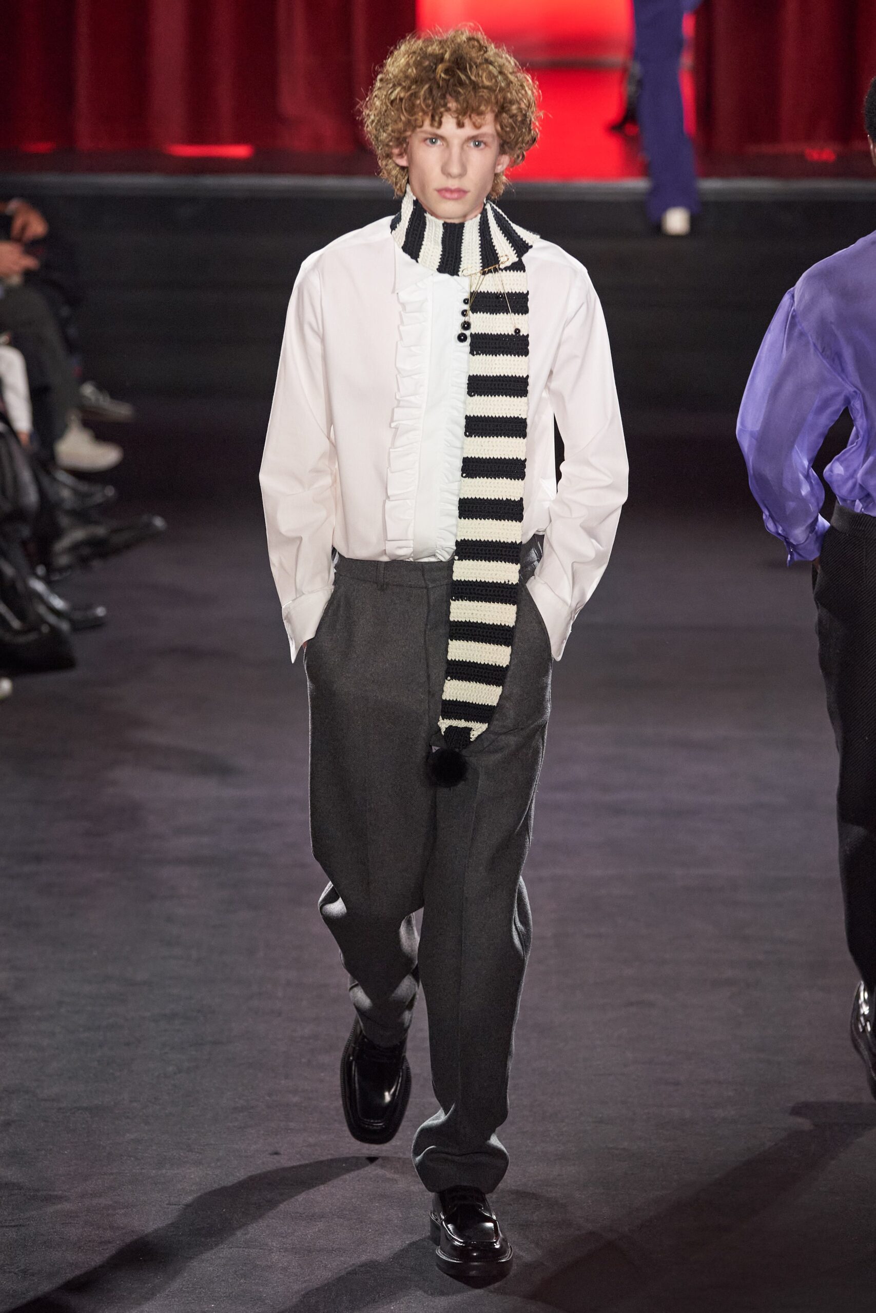 white fitted shirt with gray pants