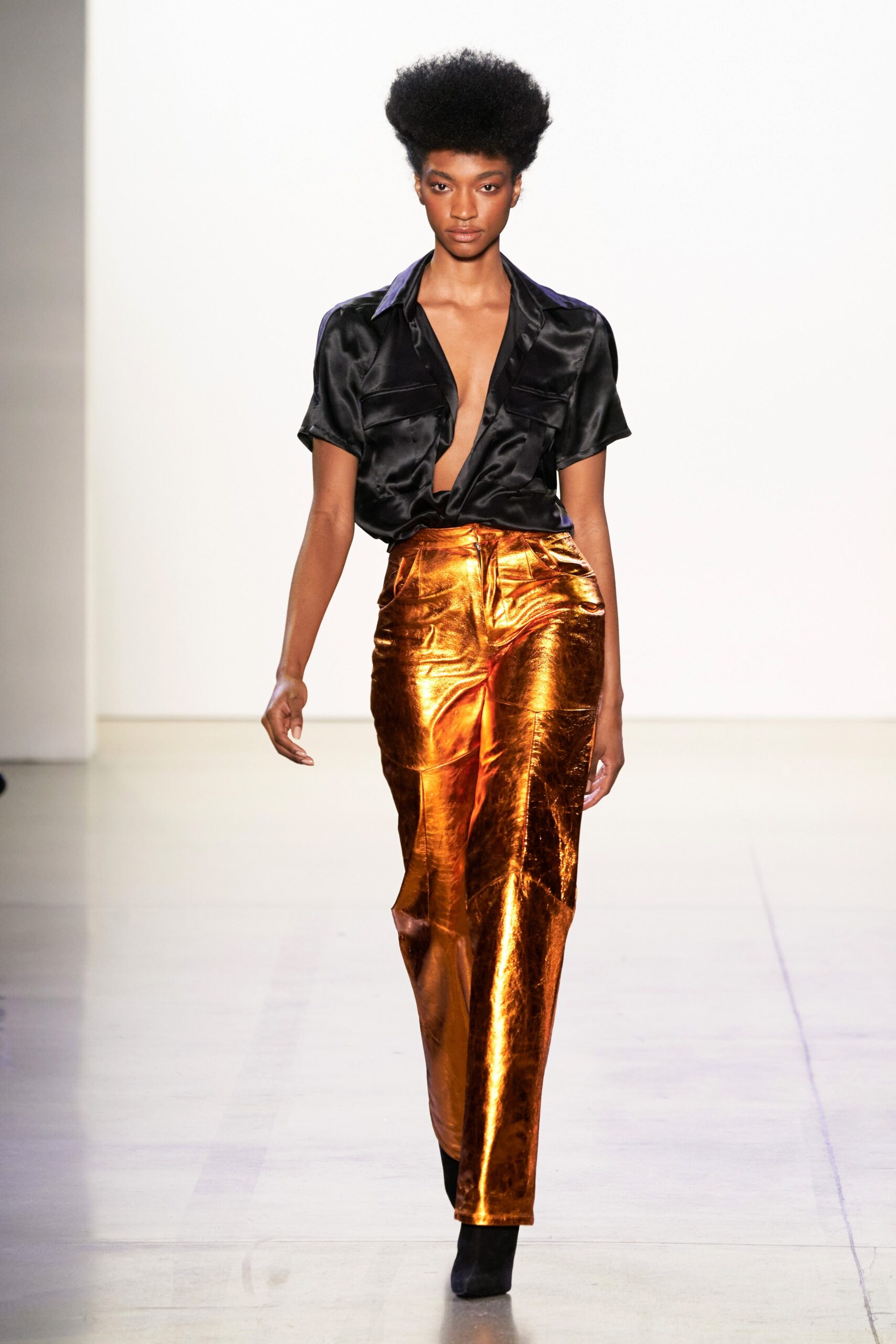 black silk shirt and orange pants