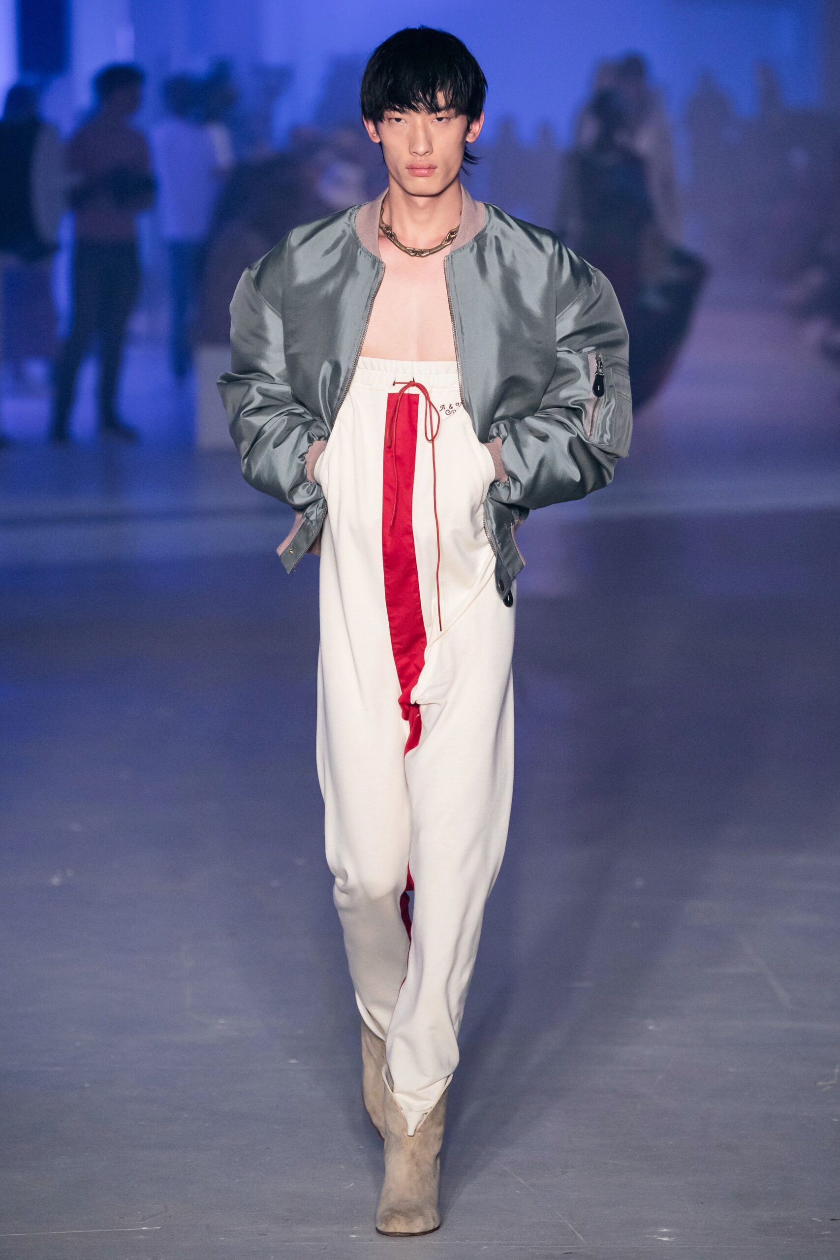 gray relaxed jacket with white jumpsuit