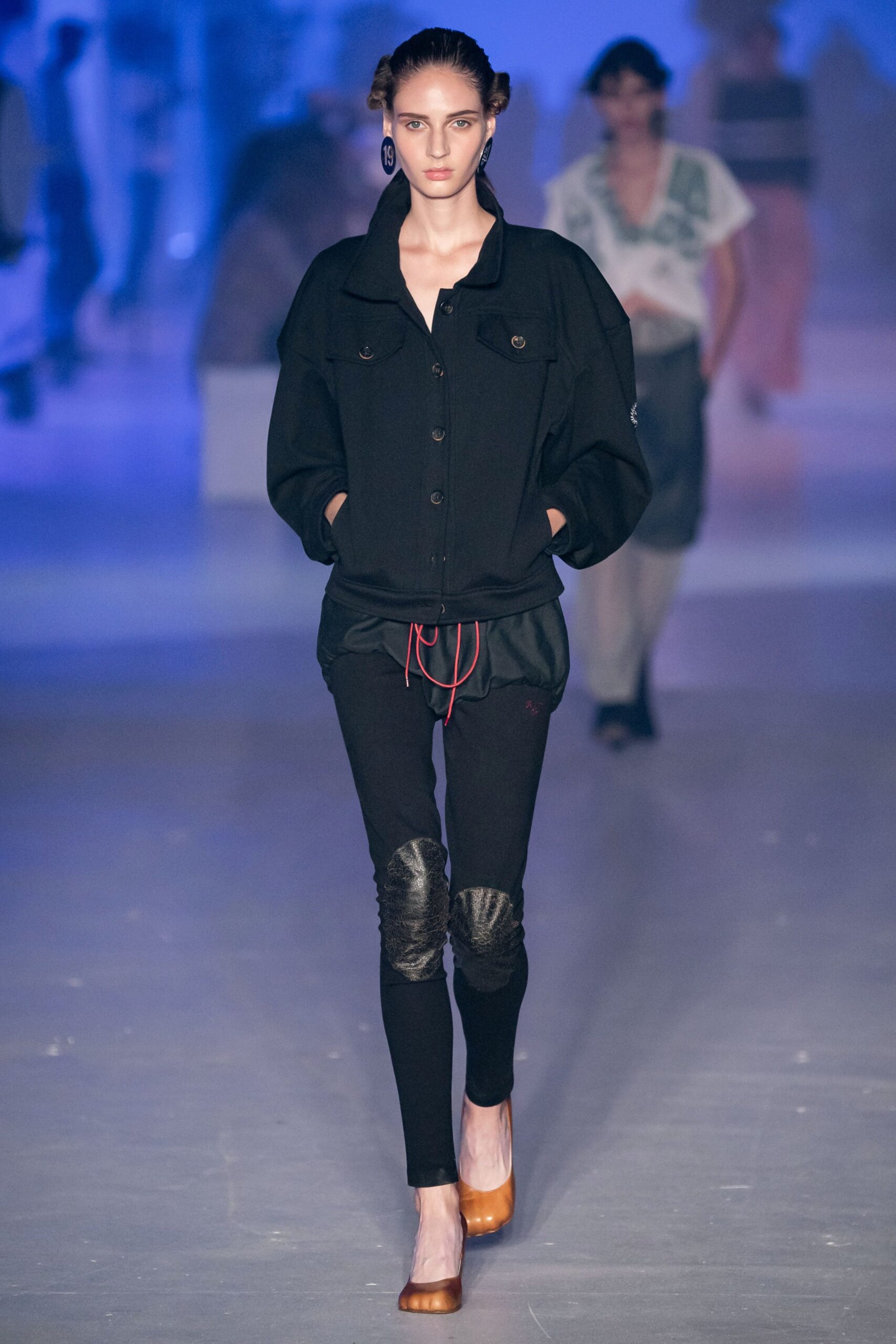 oversized black jacket with fitted pants