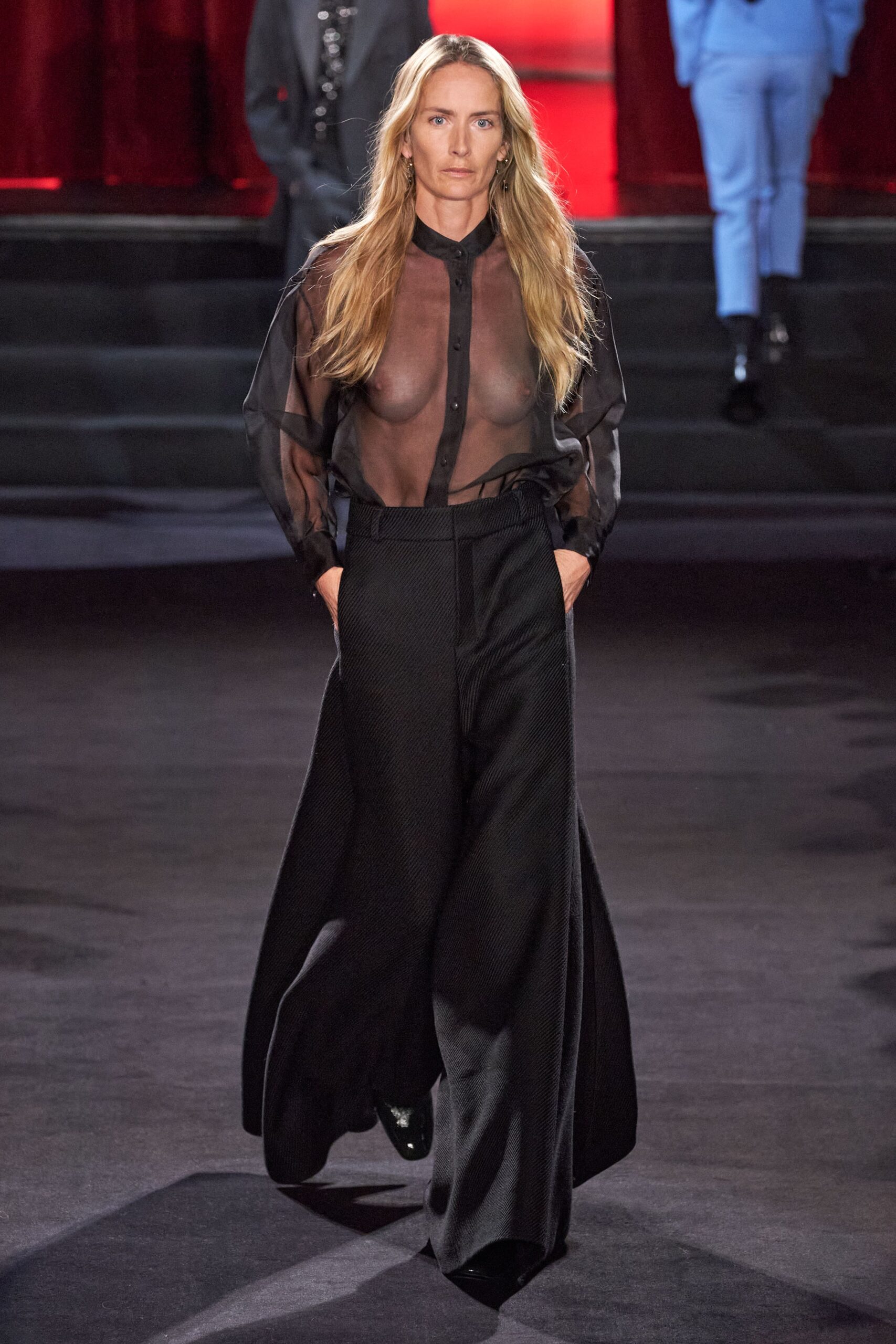black sheer blouse and wide-leg pants