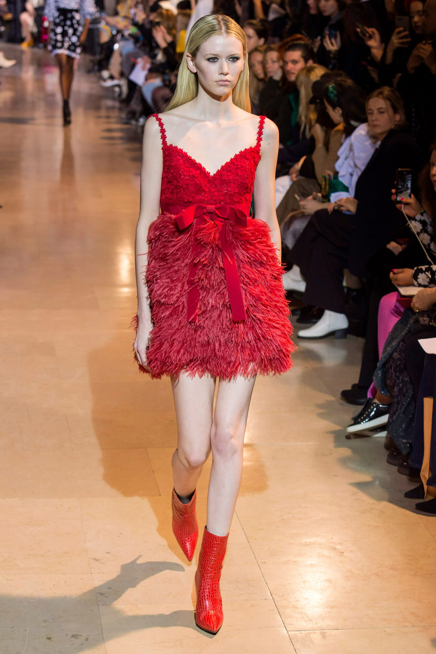 red fur sleeveless v-neck fitted ruffled belted dress