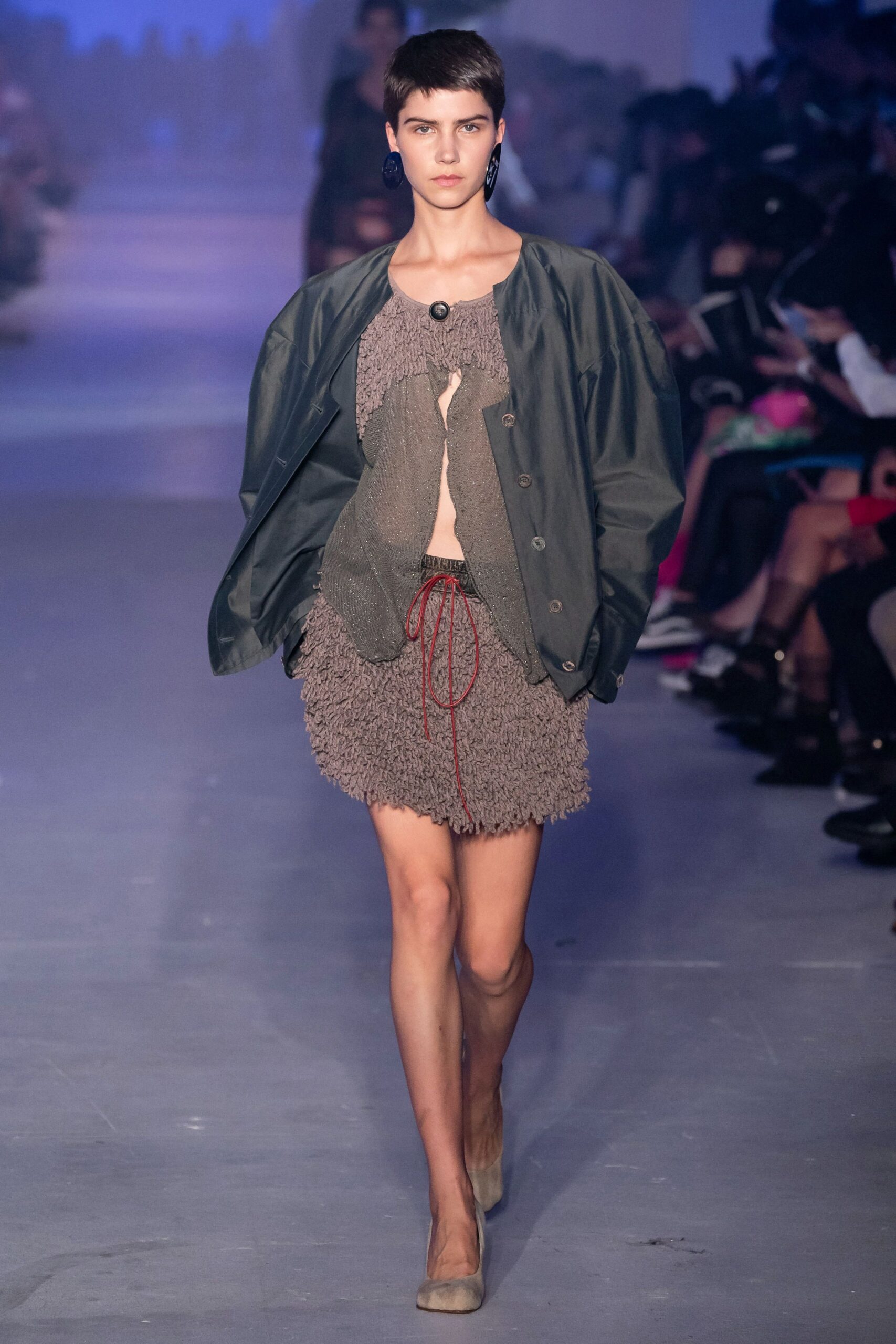 green relaxed jacket and brown fitted dress