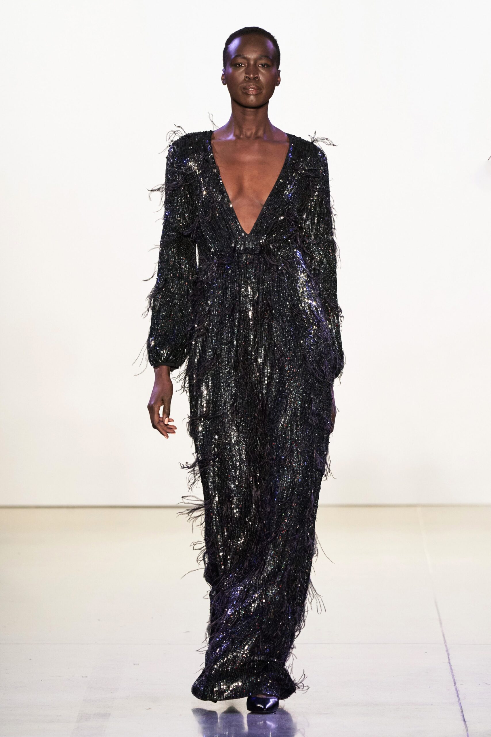 black sequin fringed gown
