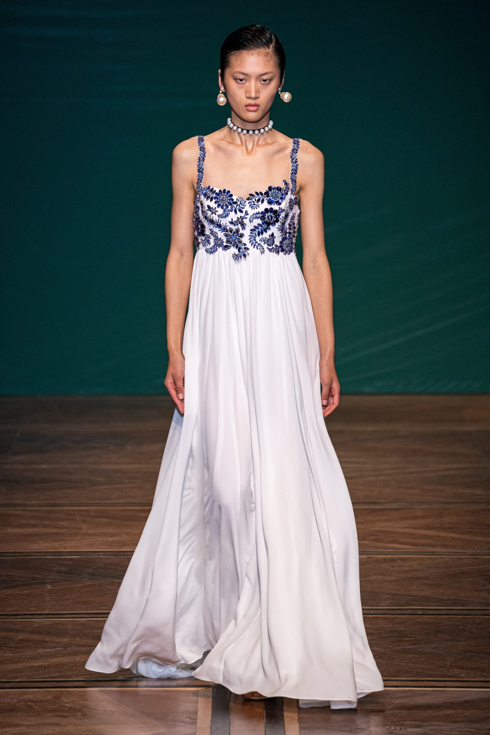 white silk embroidered gown