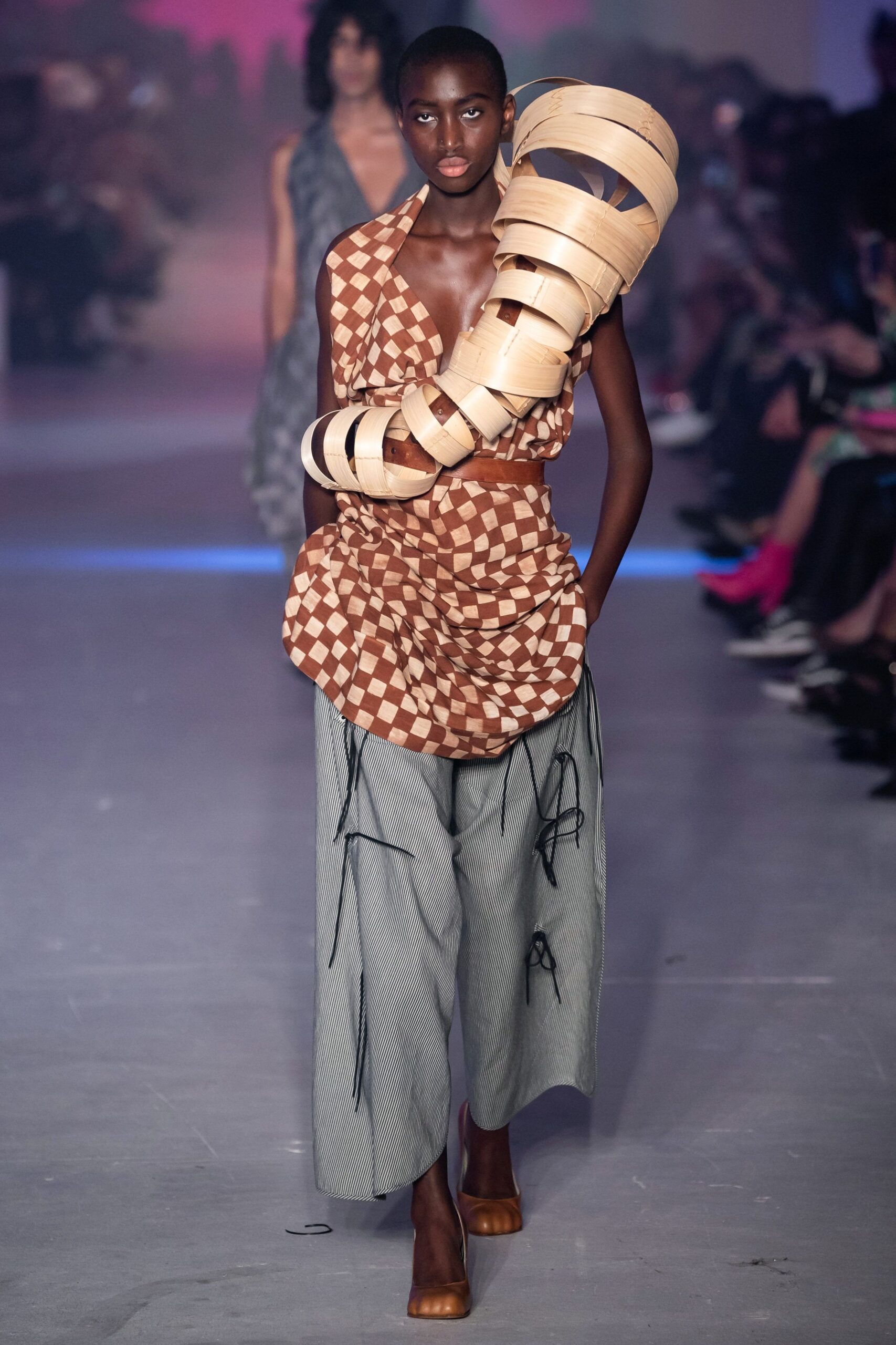 relaxed brown checked top with gray pants