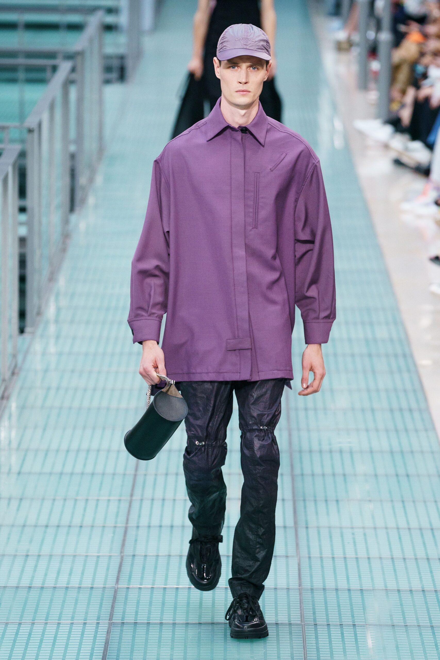 purple shirt black pants outfit