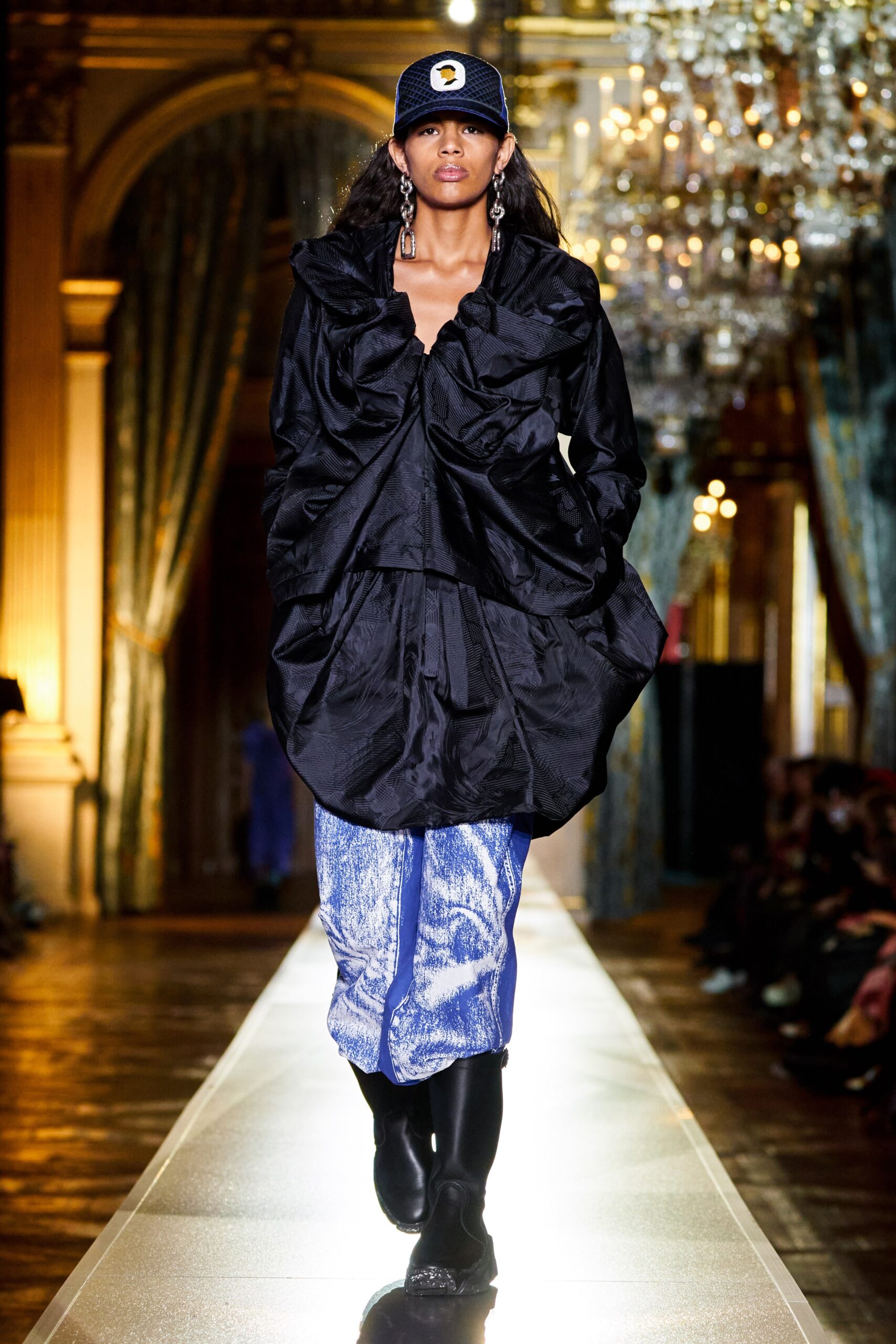 oversized black silk top with blue pants