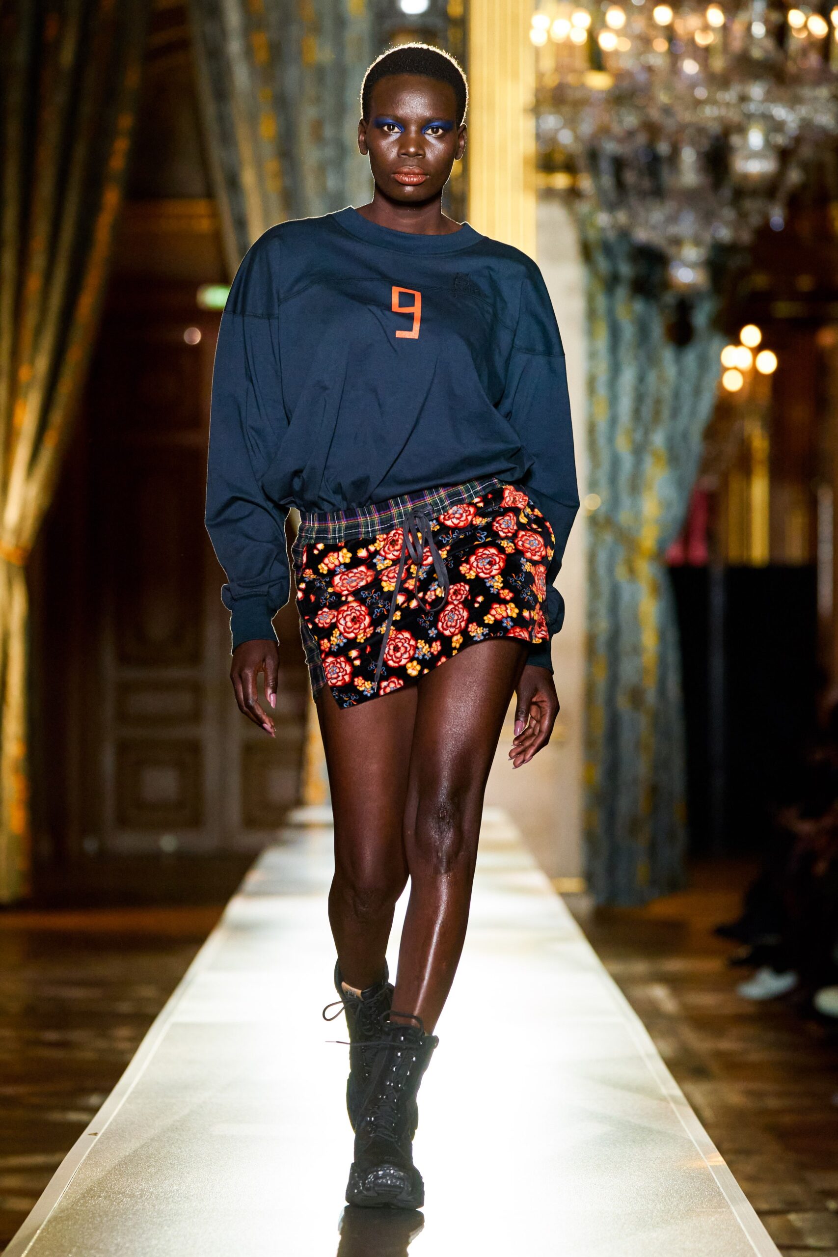 black relaxed top with mini skirt