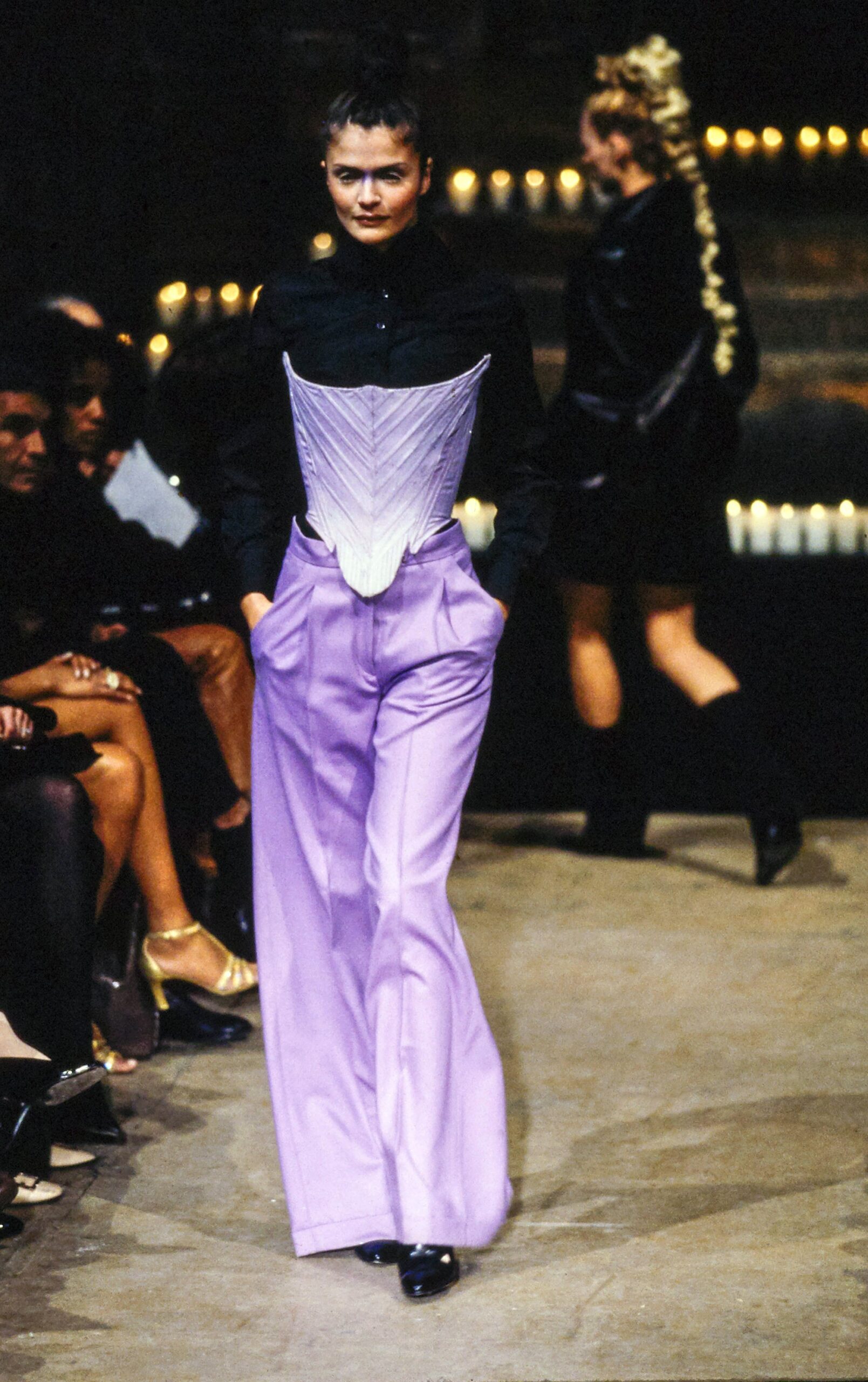 white silk corset and purple pants