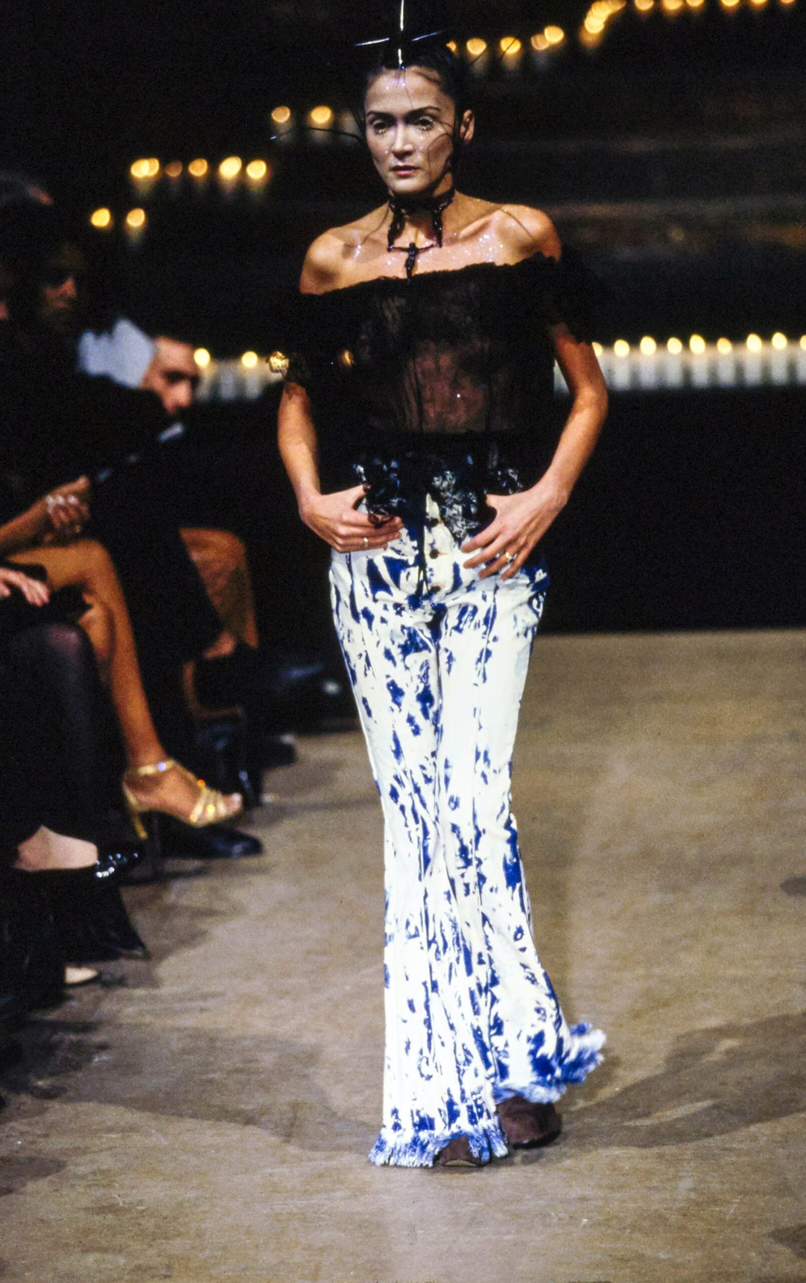 black off-shoulder top and flared pants