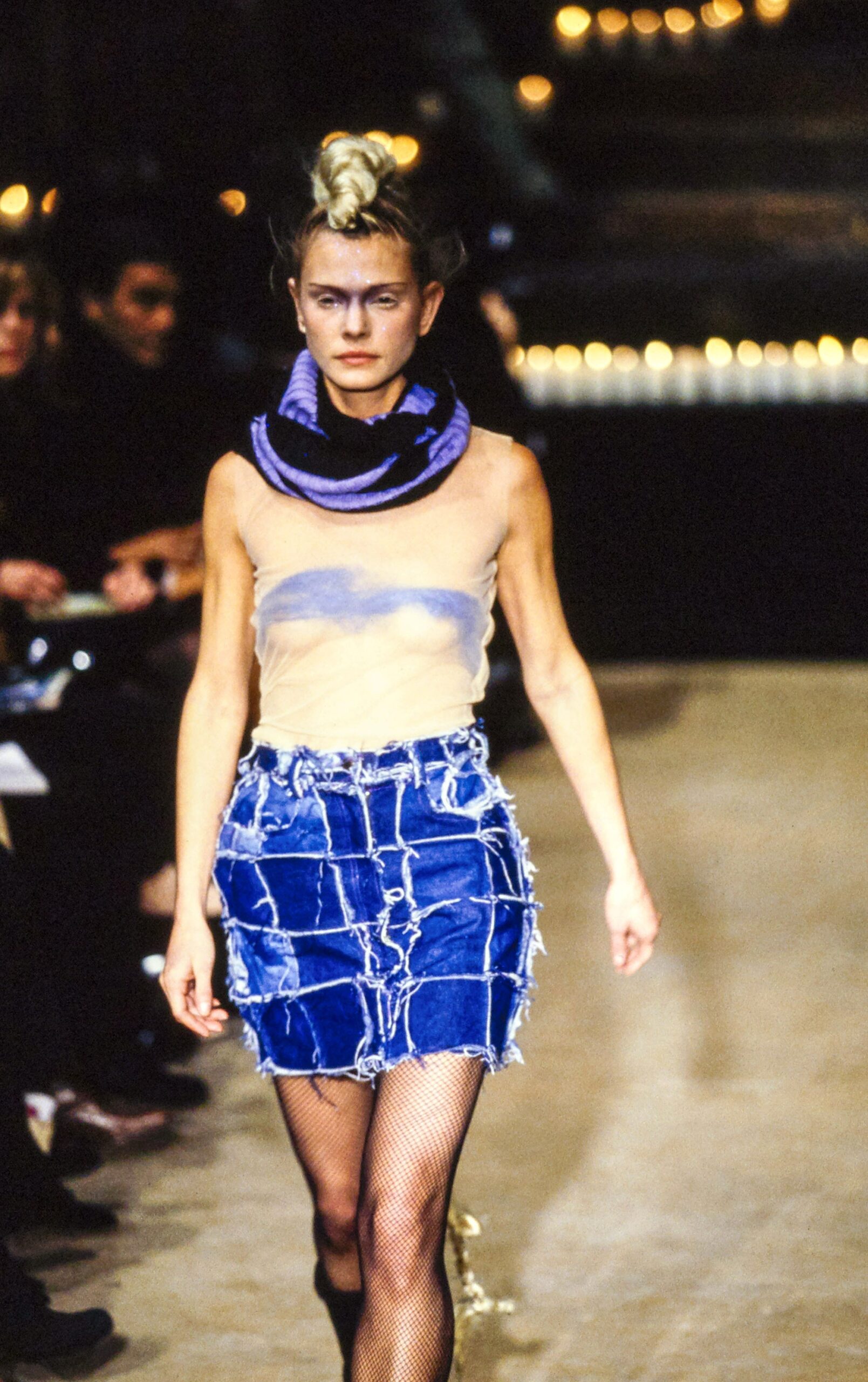 beige fitted top with distressed denim skirt