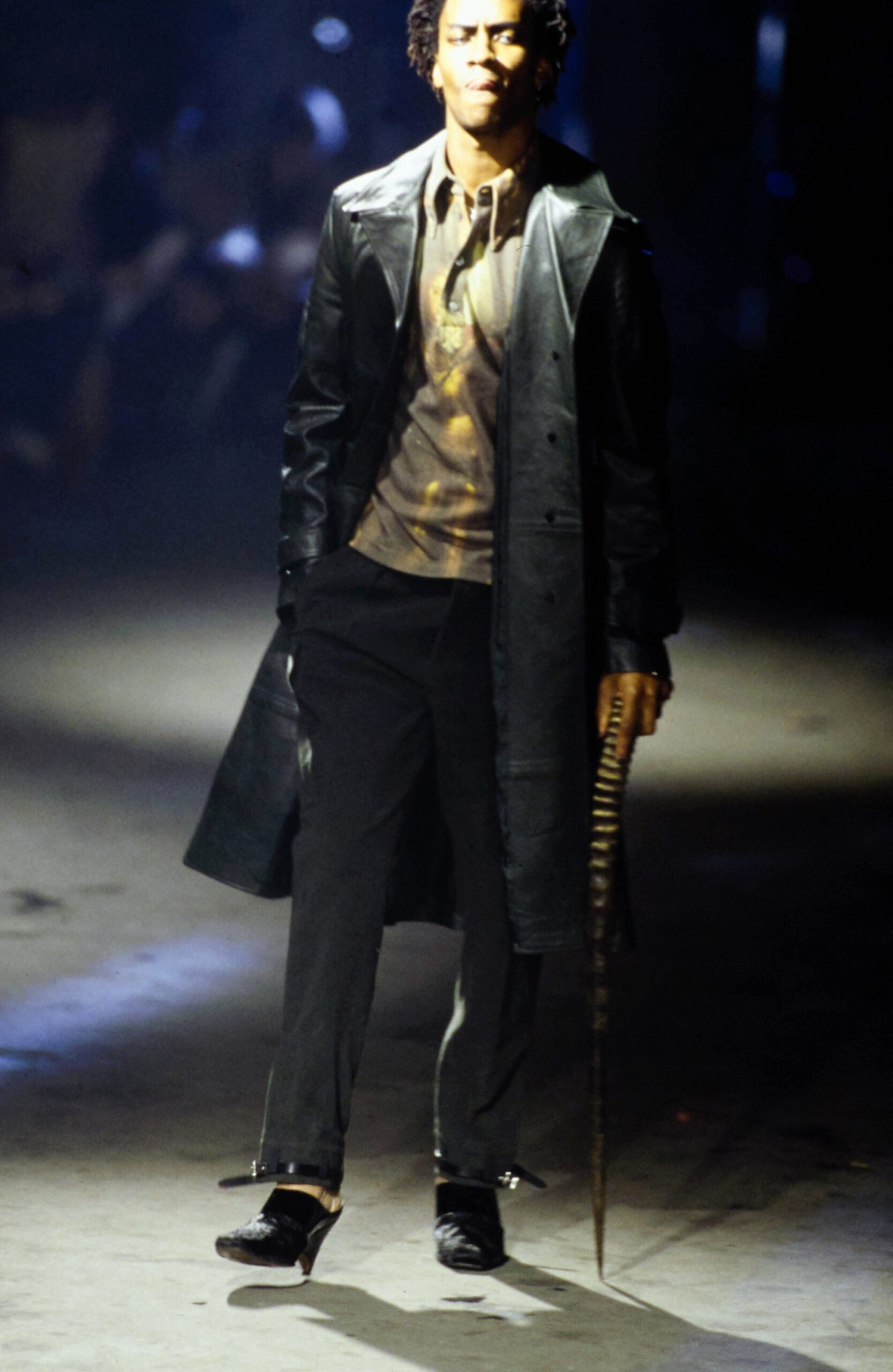 black leather long-sleeve collared fitted buttoned coat