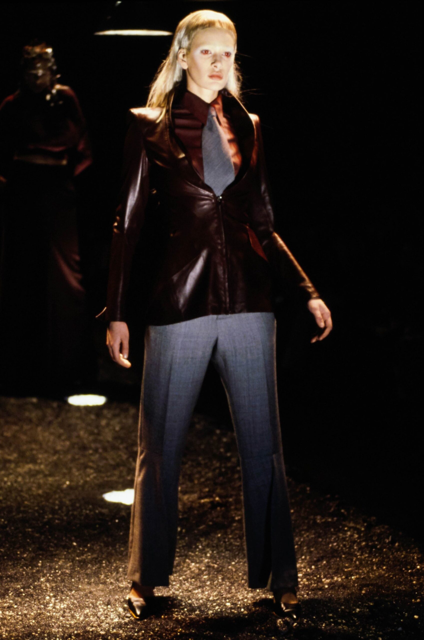 brown leather fitted blazer and gray tailored pants