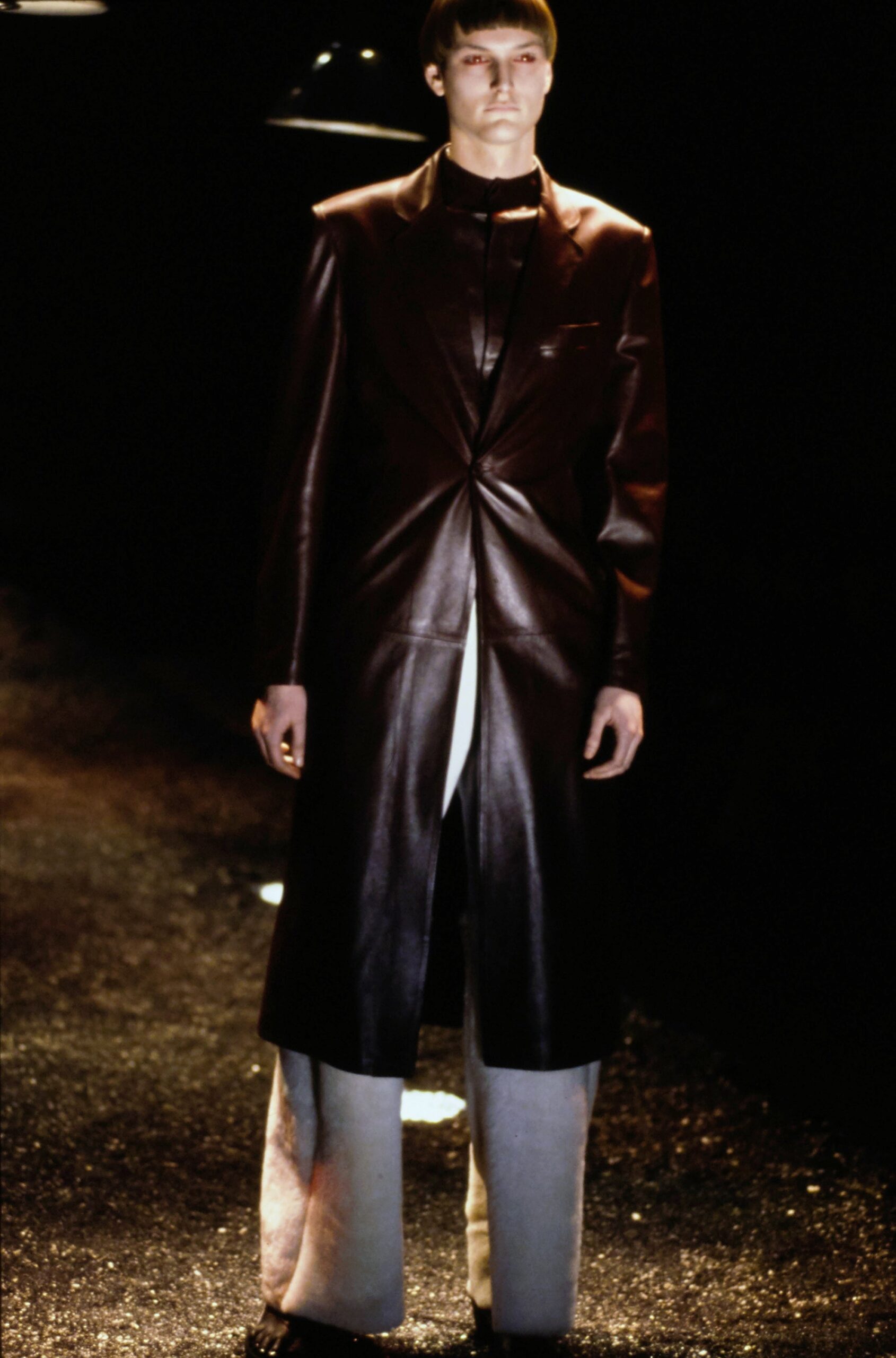 brown leather coat with gray pants