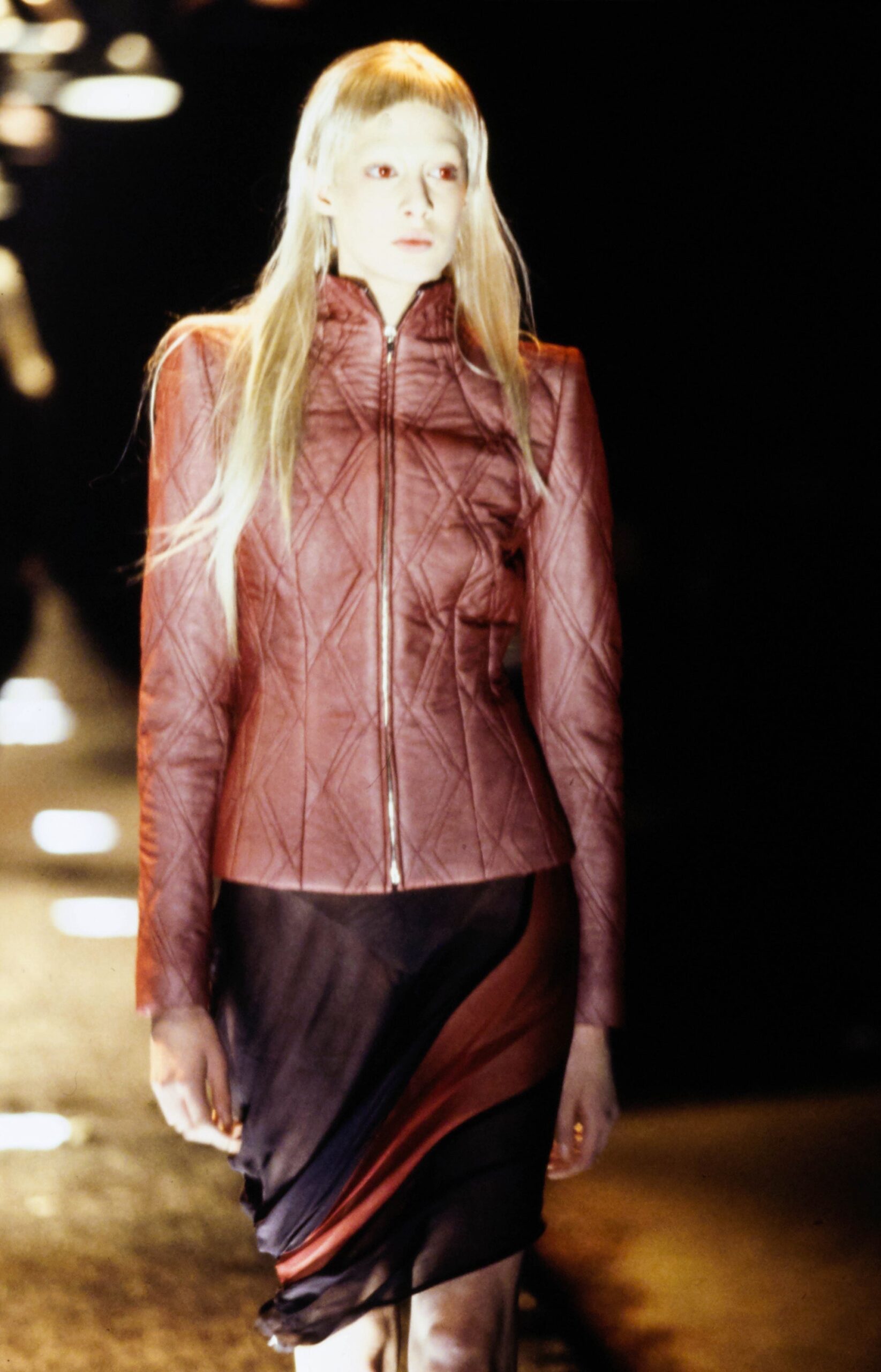 fitted red leather jacket and black silk dress