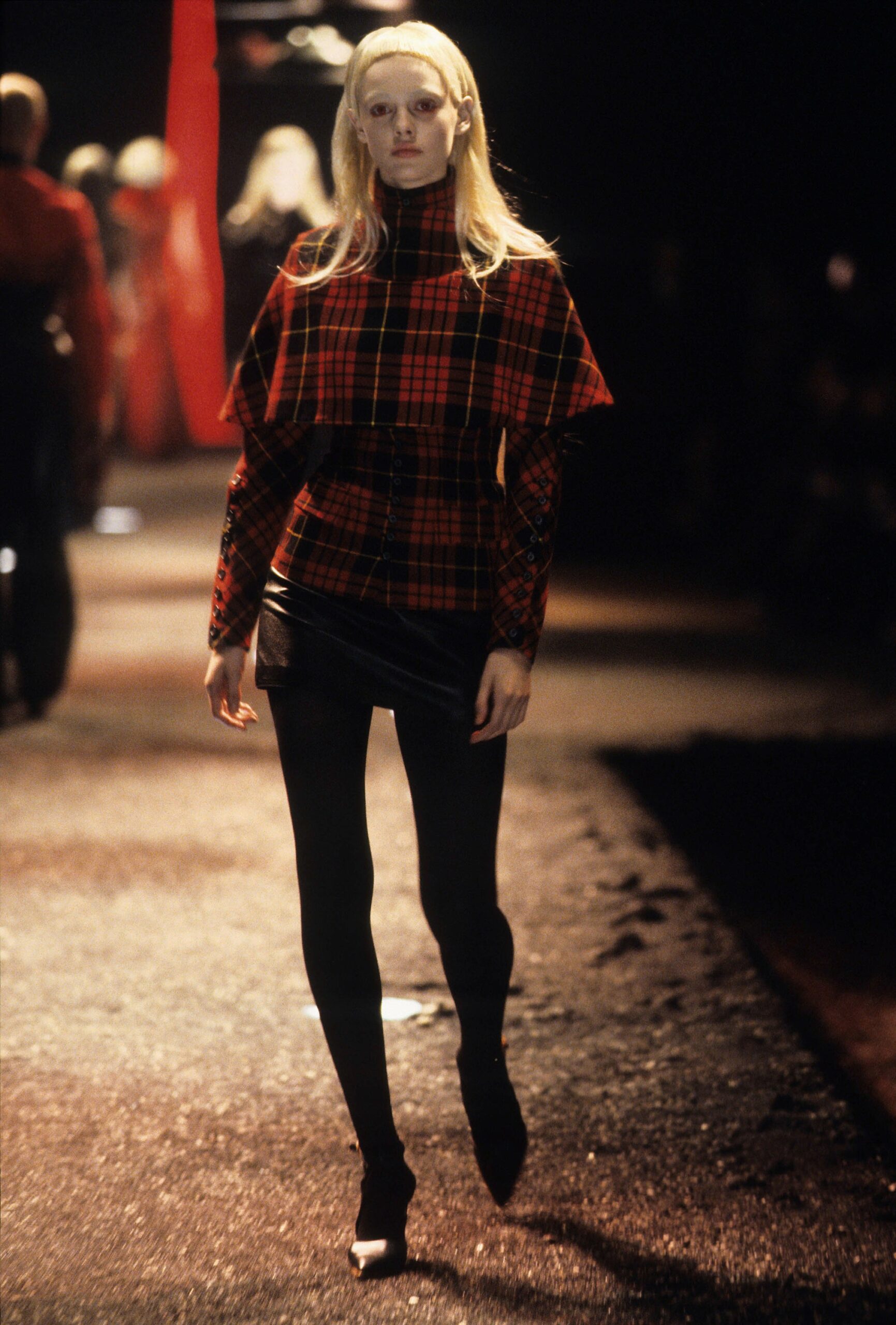 red and black checked top with leather skirt