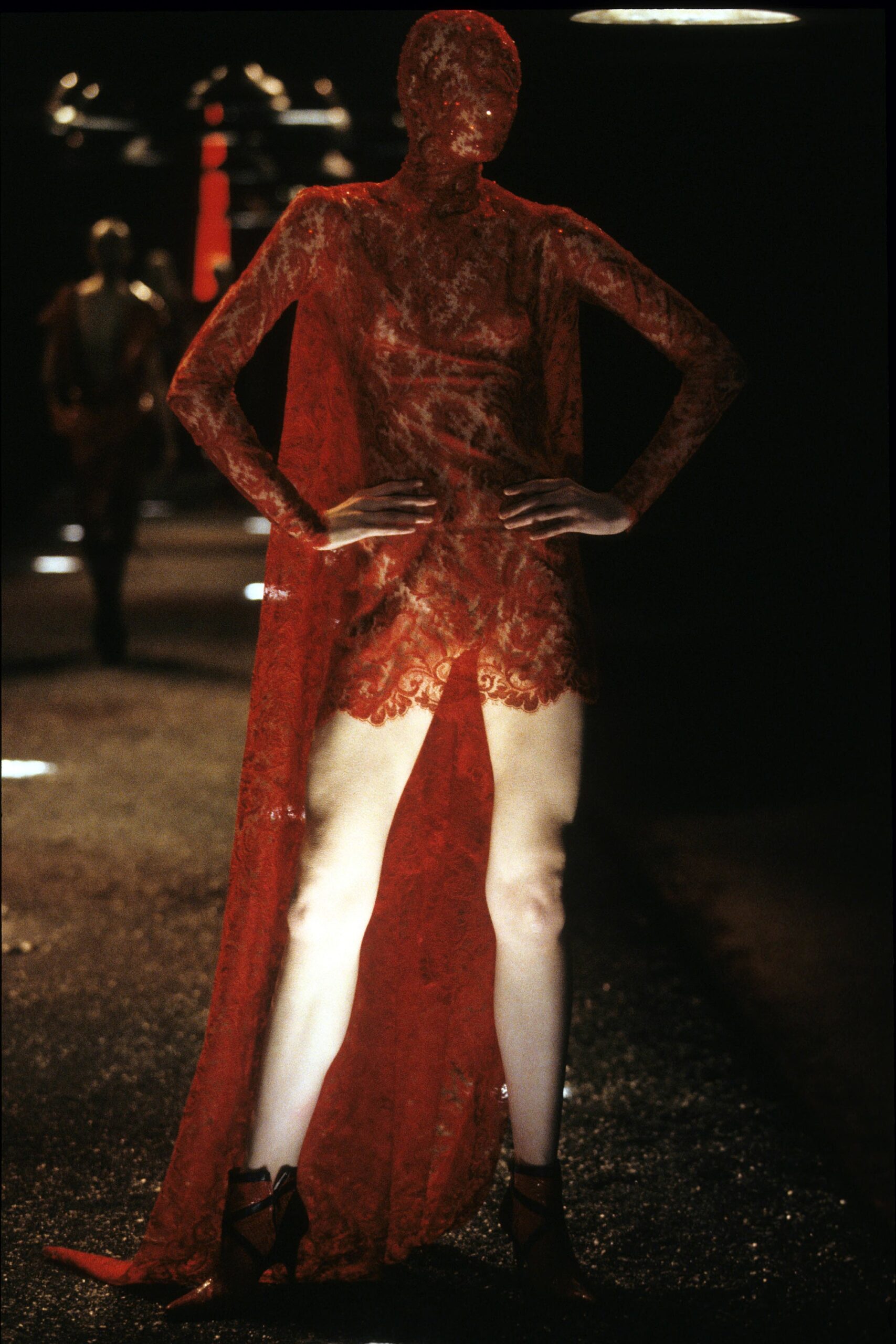 red lace fitted dress and cape