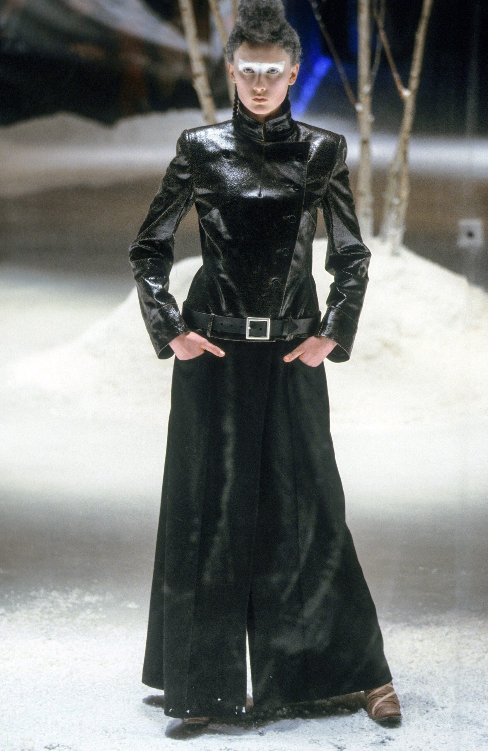 black vinyl fitted jacket and wide-leg pants