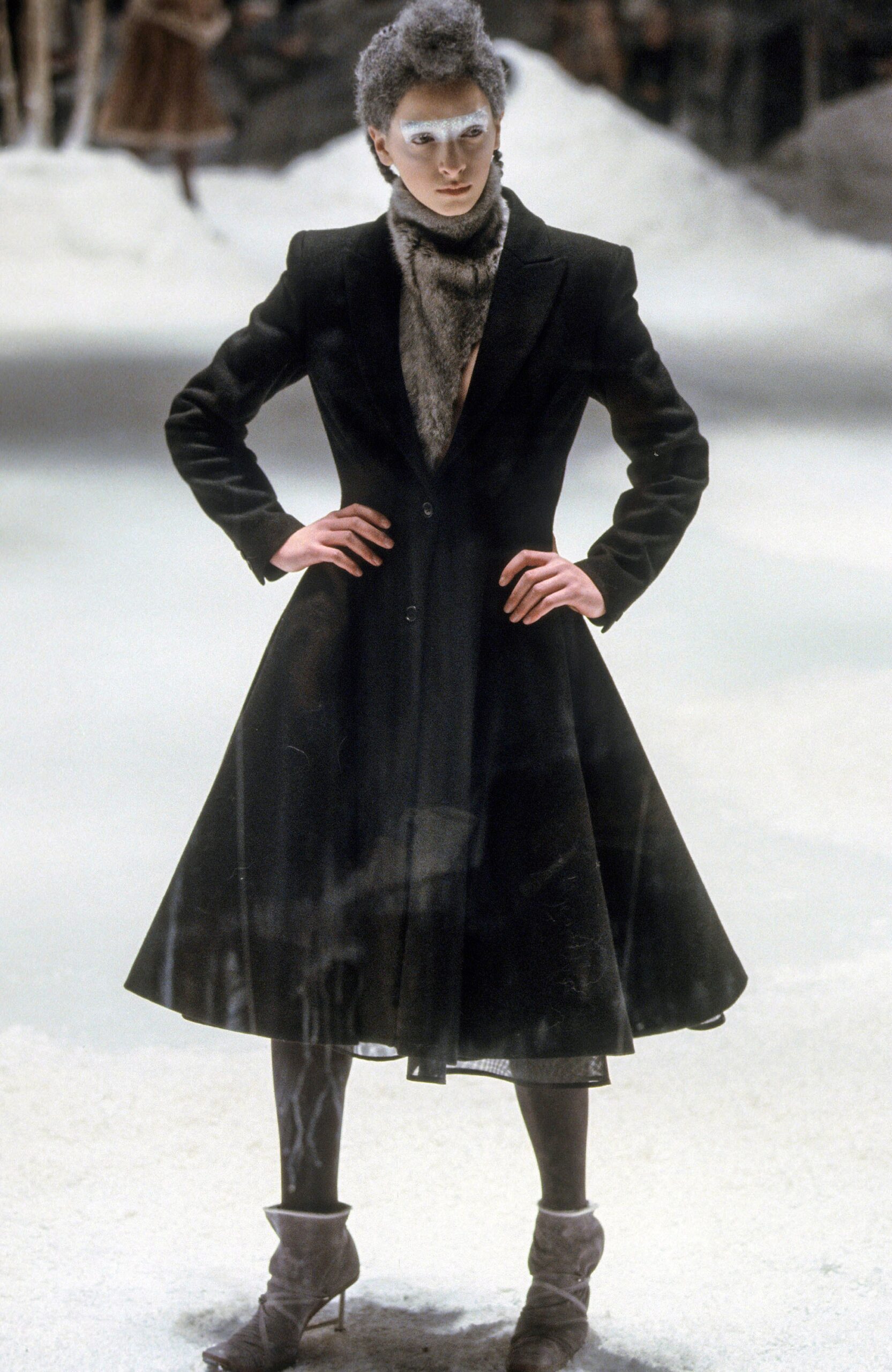 black wool fitted coat with gray scarf