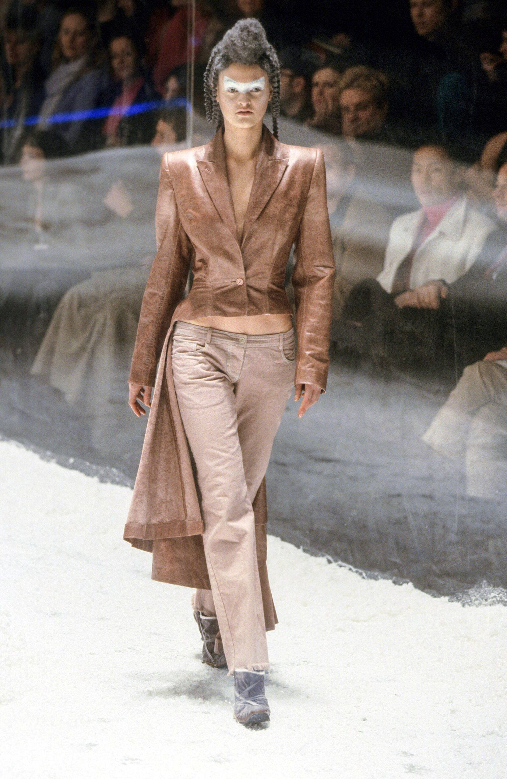 brown leather fitted blazer and beige pants