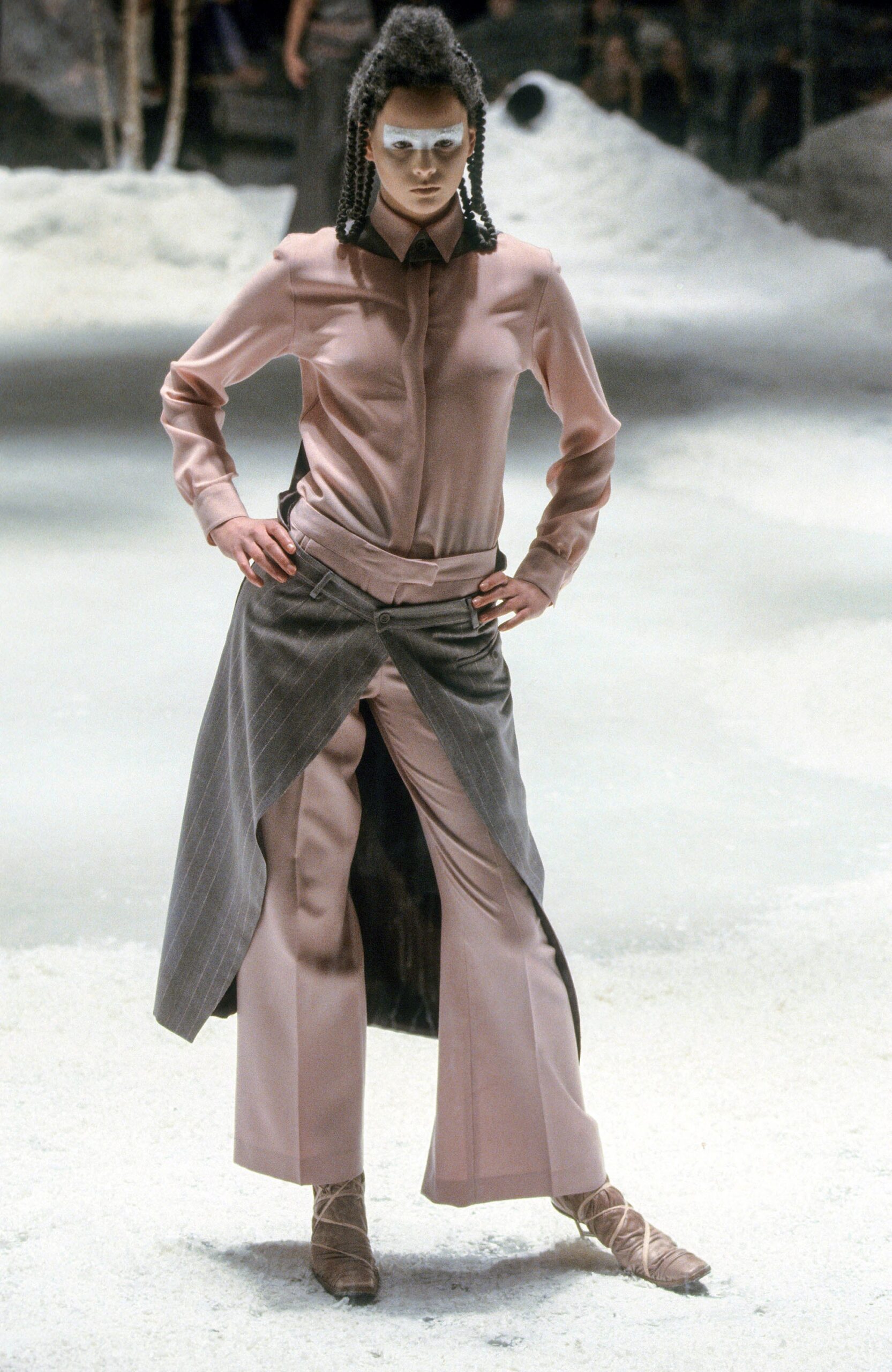 pink fitted shirt with gray pants