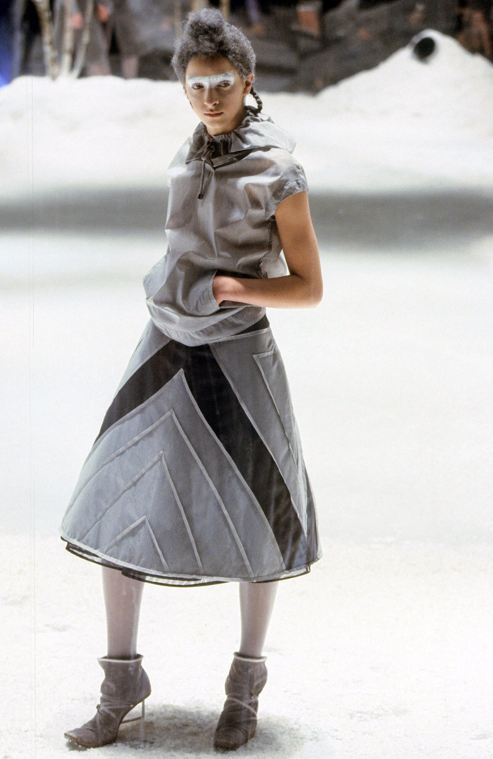gray relaxed top and pleated skirt