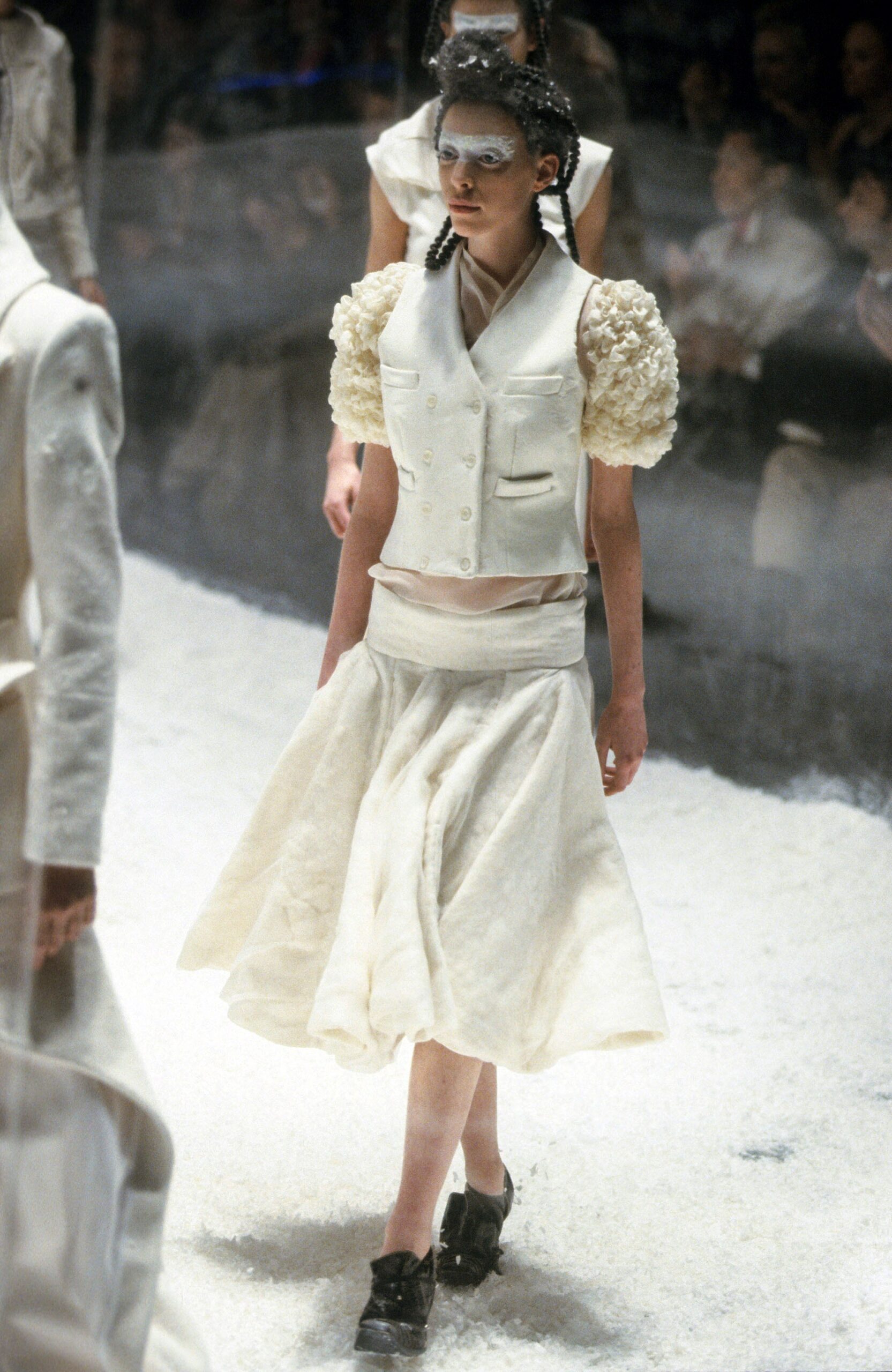 white fitted blouse and flared skirt