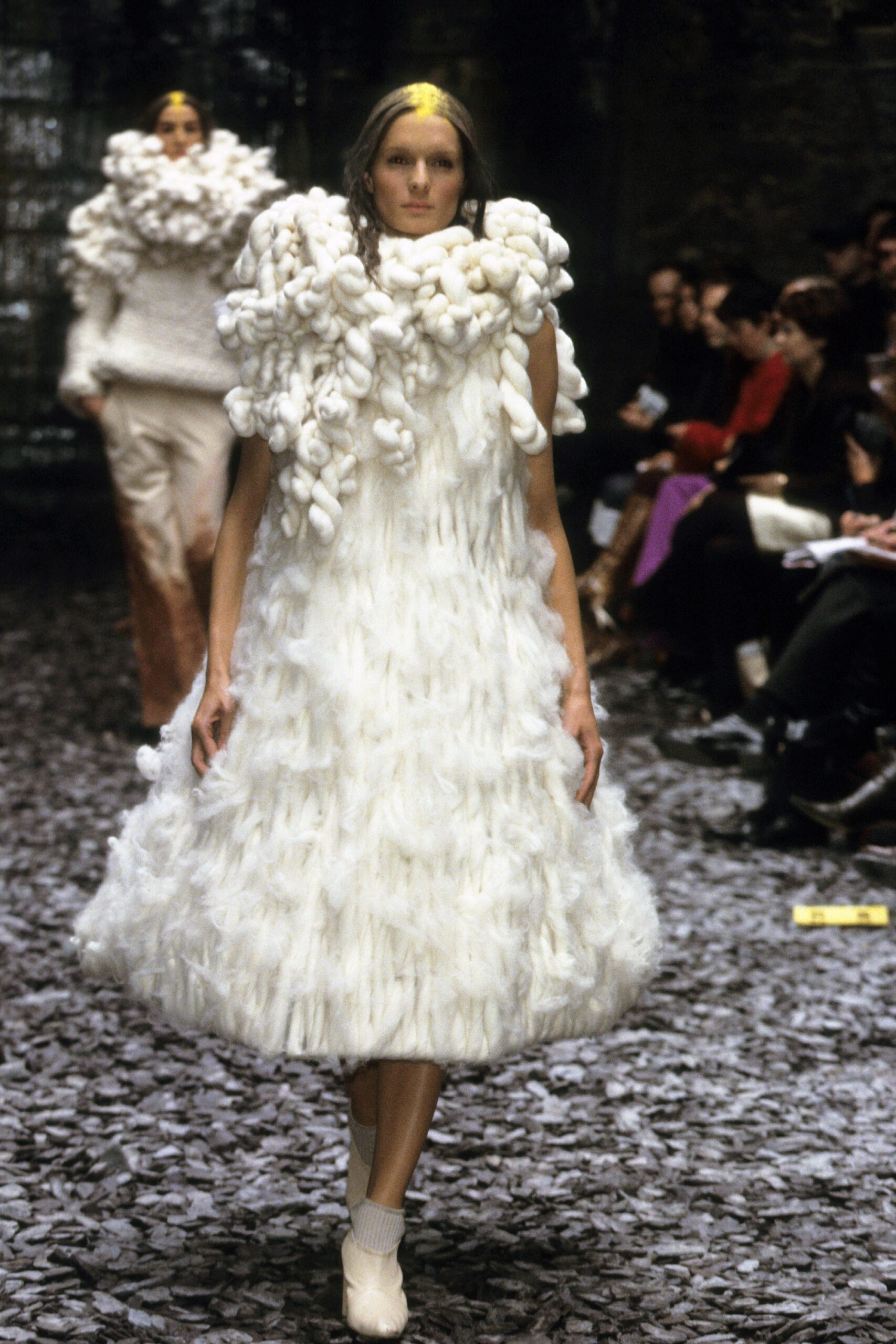 white ruffled sleeveless dress