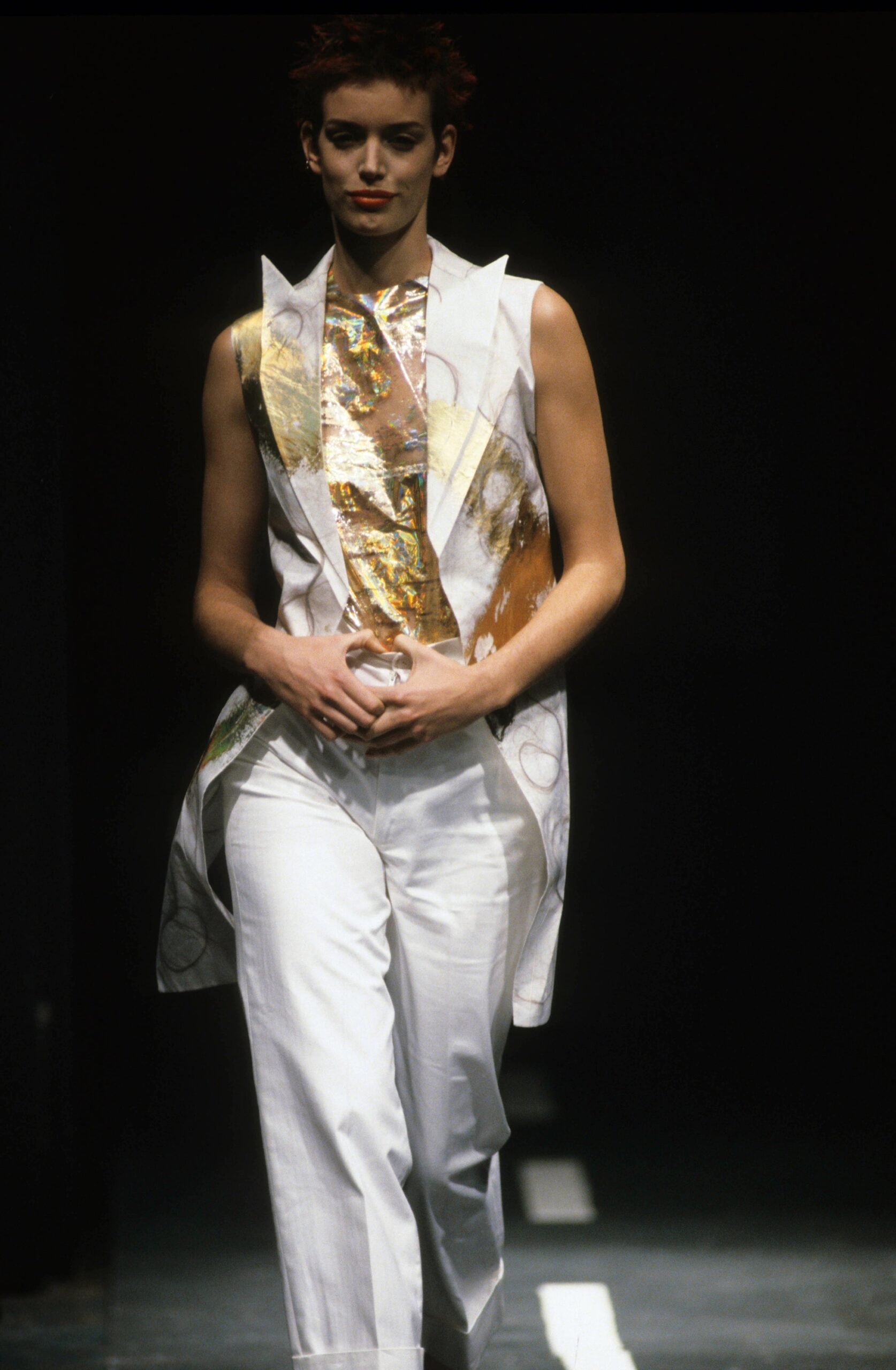 white silk draped top with relaxed pants