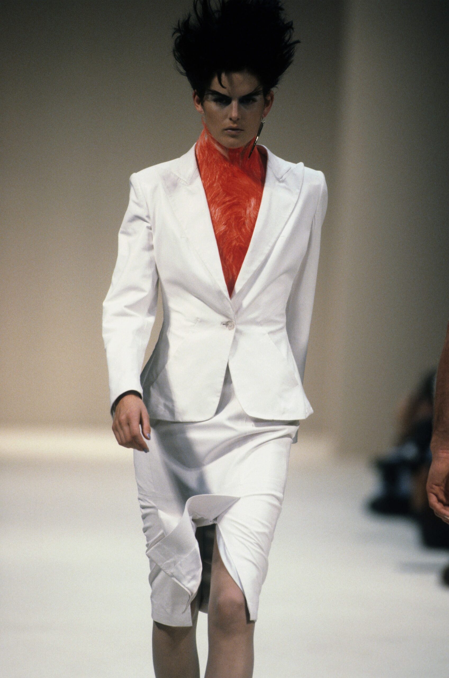white tailored suit with red top