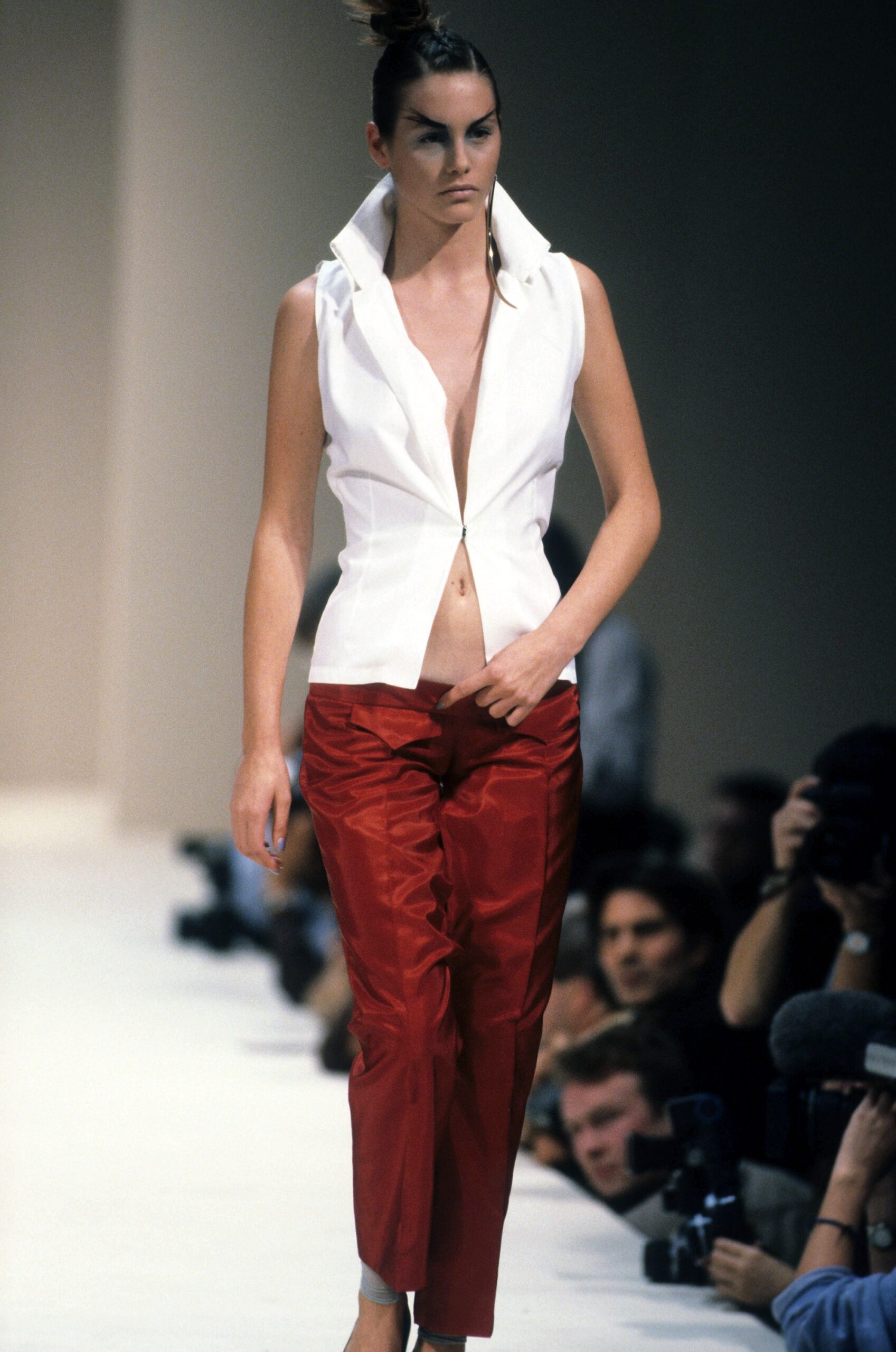 fitted white top and tailored red pants